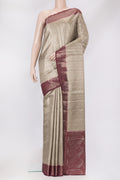 Beige Dual Tone Tussar Silk Saree with Zari Brocade on the body and Zari Border.  displayed on a mannequin