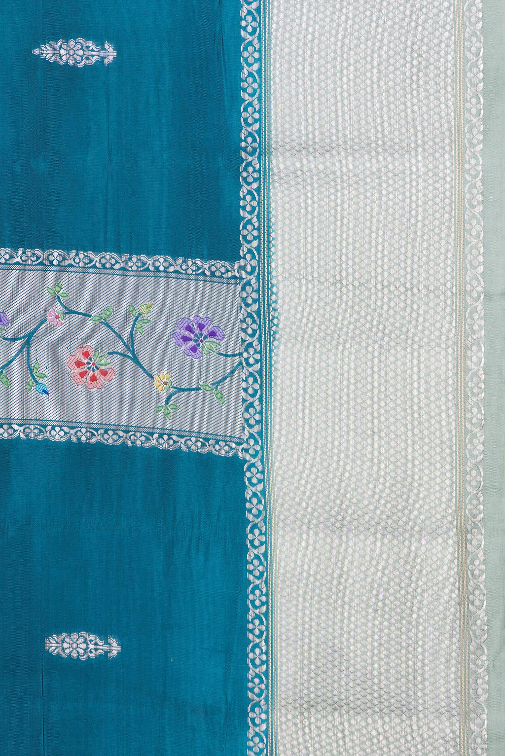Border image of Peacock Blue Dual Tone Tussar Silk Saree with Zari Butta on the body and Zari Border. 