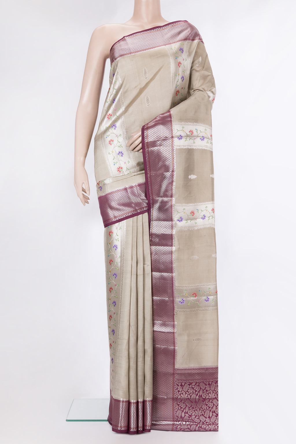 Pure Silk Beige Dual Tone Tussar Saree with Zari Butta on the body and Fancy Border.  displayed on a mannequin