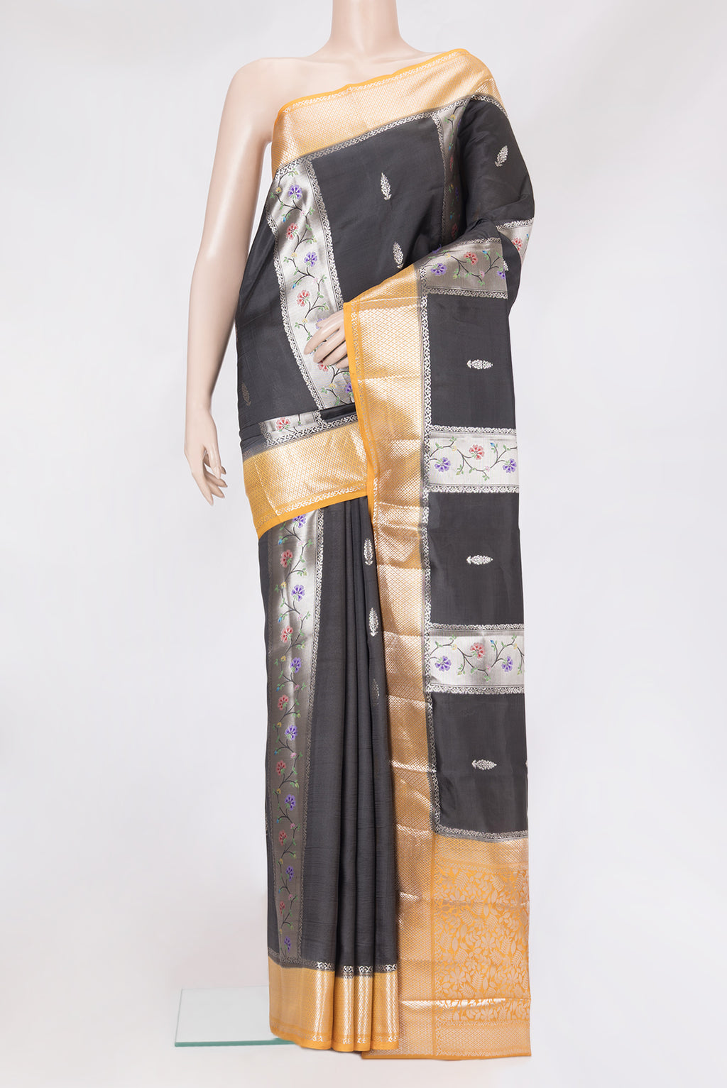 Black Dual Tone Tussar Silk Saree with Zari Butta on the body and Zari Border.  displayed on a mannequin