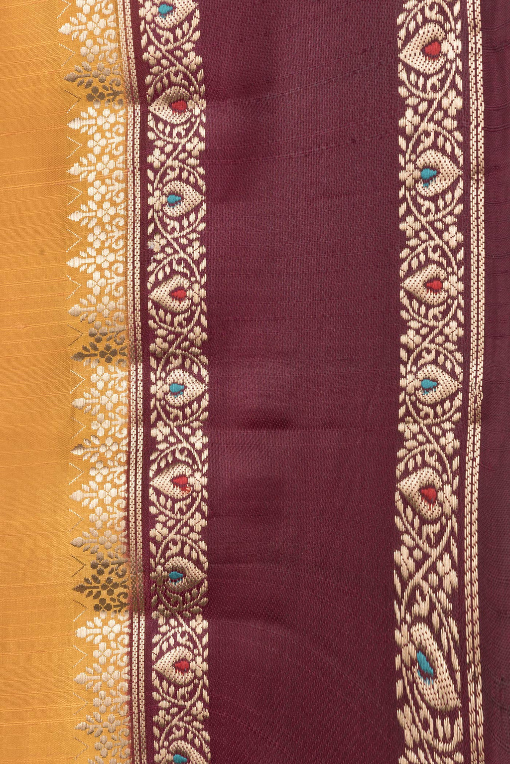Border image of Mustard Dual Tone Tussar Silk Saree with Zari Butta on the body and Fancy Border. 