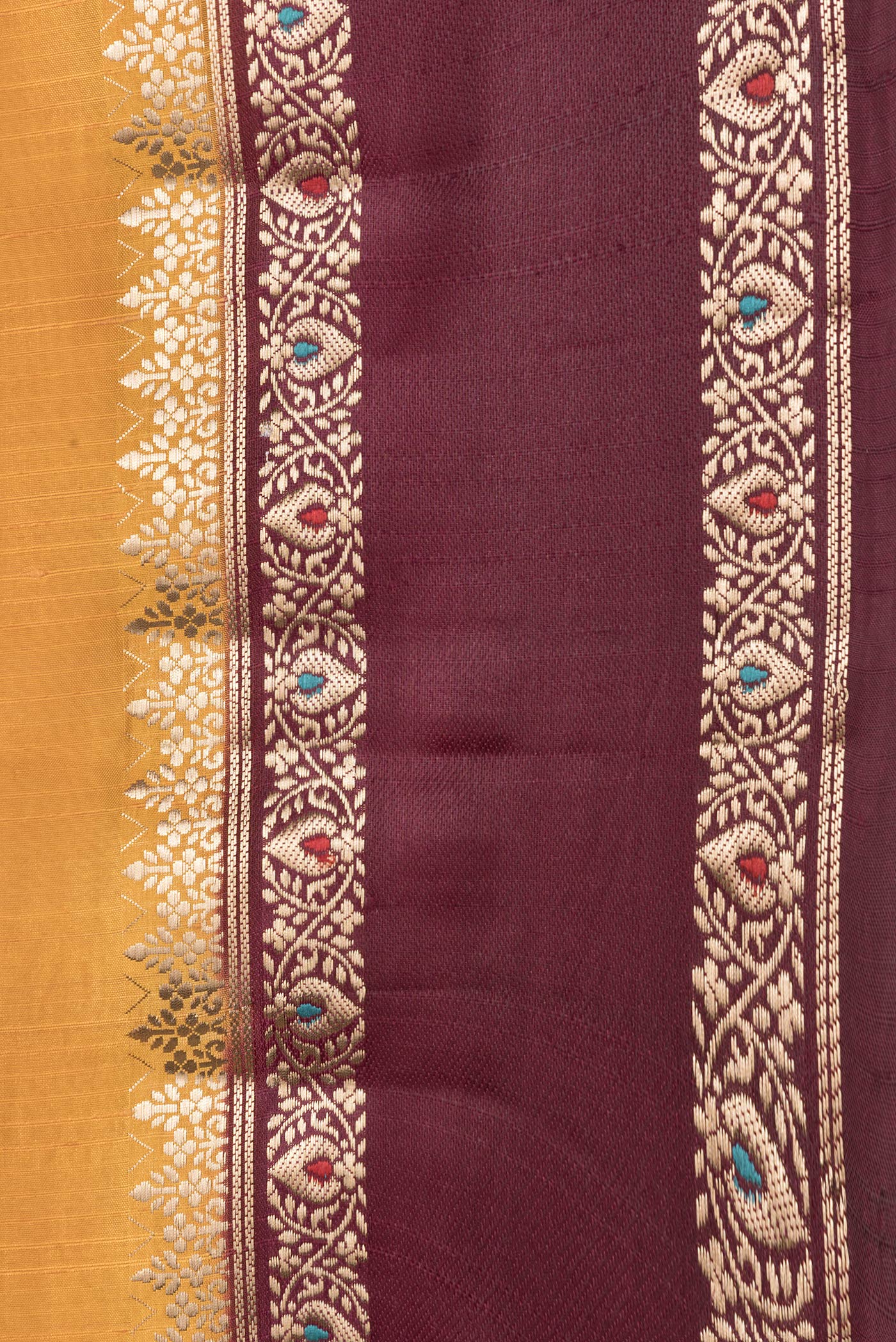 Border image of Mustard Dual Tone Tussar Silk Saree with Zari Butta on the body and Fancy Border. 