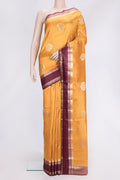 Mustard Dual Tone Tussar Silk Saree with Zari Butta on the body and Fancy Border.  displayed on a mannequin