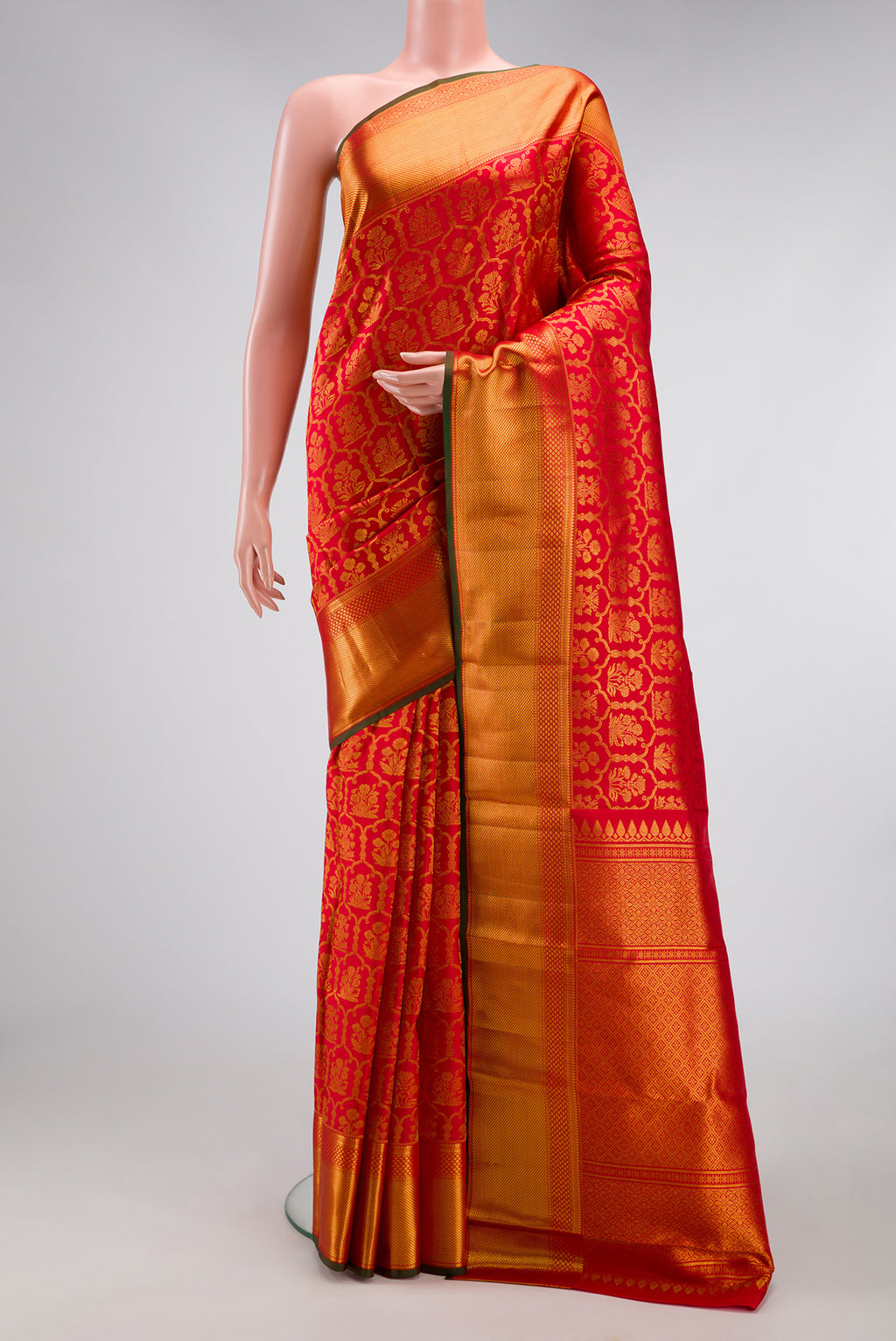 Red Kanchipuram Silk Saree with Zari Brocade on the body and Zari Border.  displayed on a mannequin
