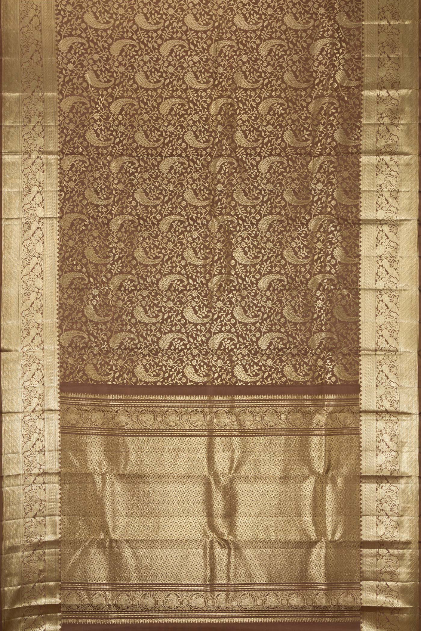 Flat view of Brown Dual Tone Kanchipuram Silk Saree with Zari Brocade on the body and Zari Border. 