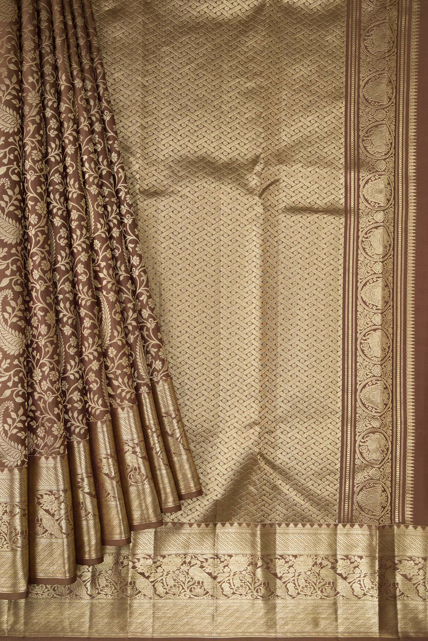 Pleats and pallu of Brown Dual Tone Kanchipuram Silk Saree with Zari Brocade on the body and Zari Border. 