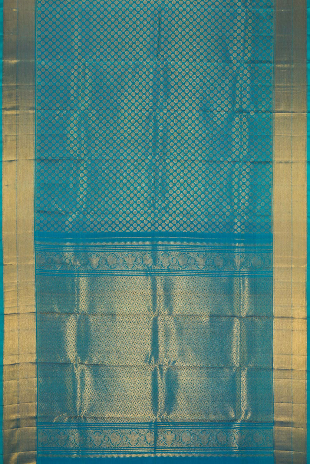 Flat view of Peacock Blue Dual Tone Kanchipuram Silk Saree with Zari Brocade on the body and Zari Border. 