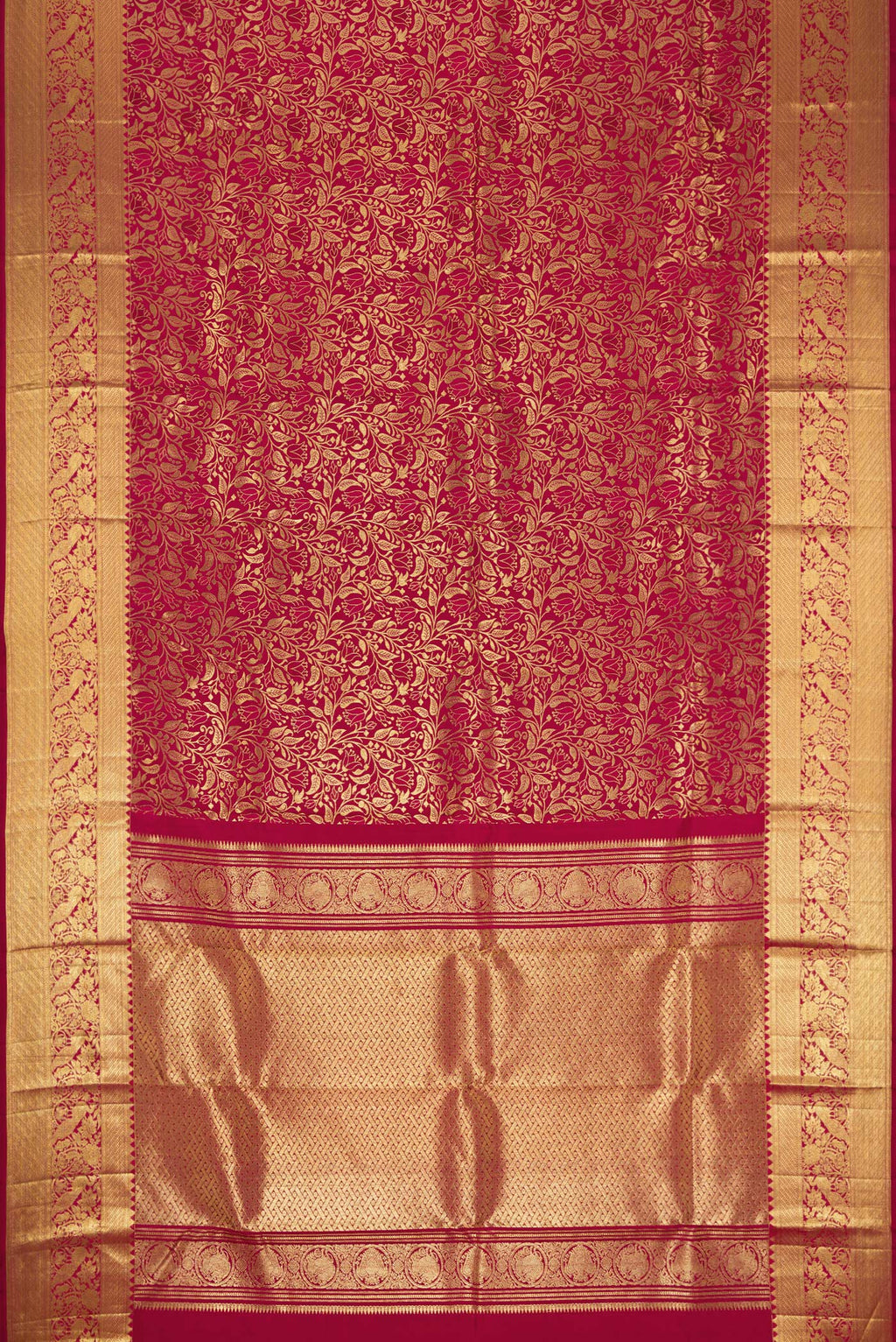 Flat view of Dark Pink Dual Tone Kanchipuram Silk Saree with Zari Brocade on the body and Zari Border. 