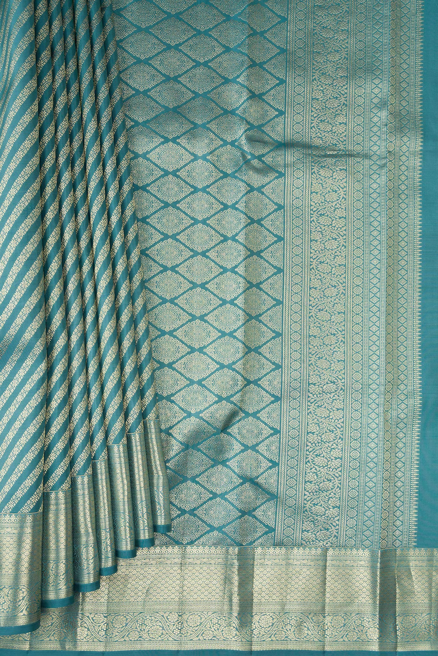 Pleats and pallu of Maya Blue Kanchipuram Silk Saree with Zari Brocade on the body and Zari Border. 