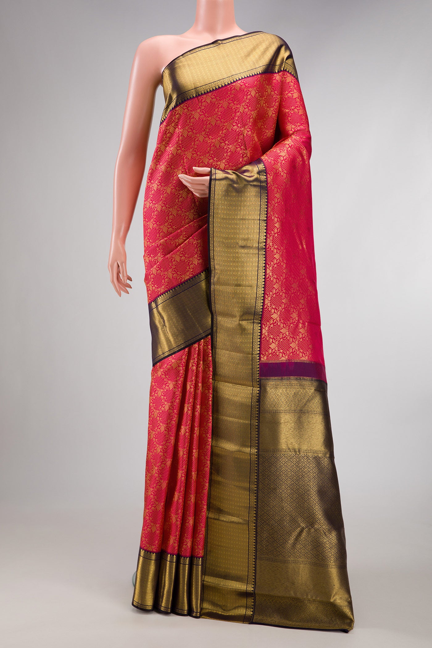 Dark Pink Dual Tone Kanchipuram Silk Saree with Zari Brocade on the body and Zari Border.  displayed on a mannequin