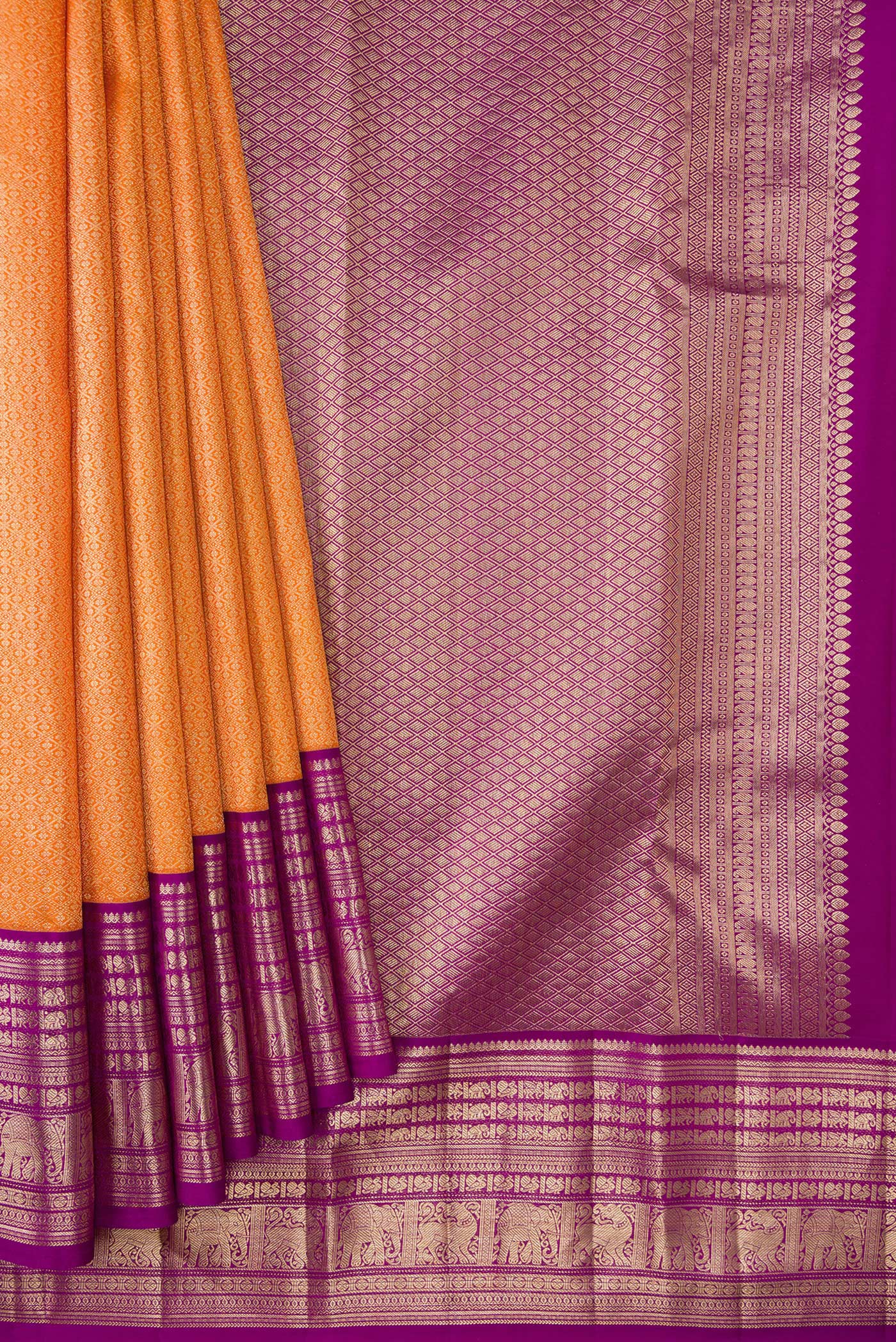 Pleats and pallu of Orange Dual Tone Kanchipuram Silk Saree with Zari Brocade on the body and Zari Border. 