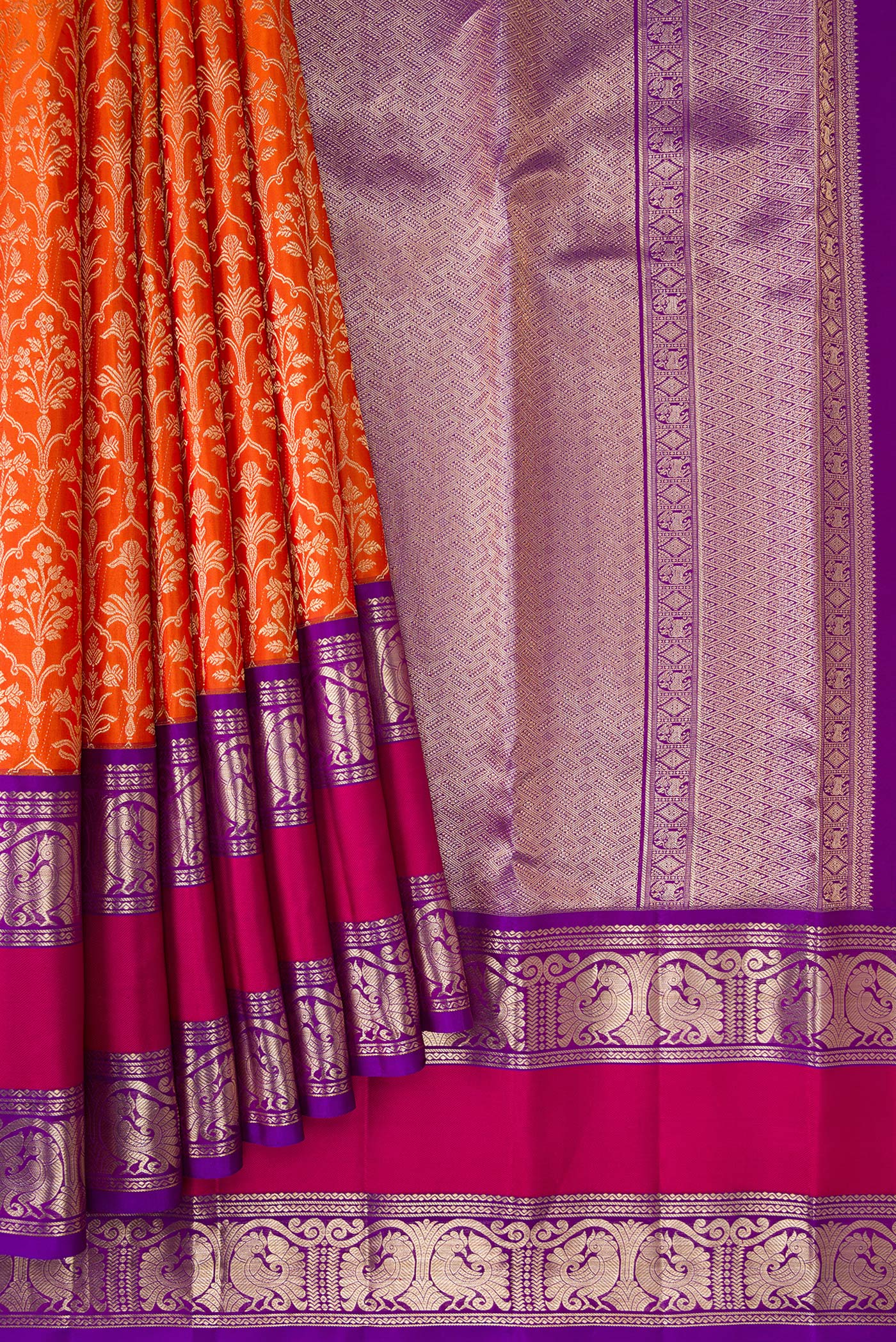 Pleats and pallu of Orange Dual Tone Kanchipuram Silk Saree with Zari Brocade on the body and Zari Border. 