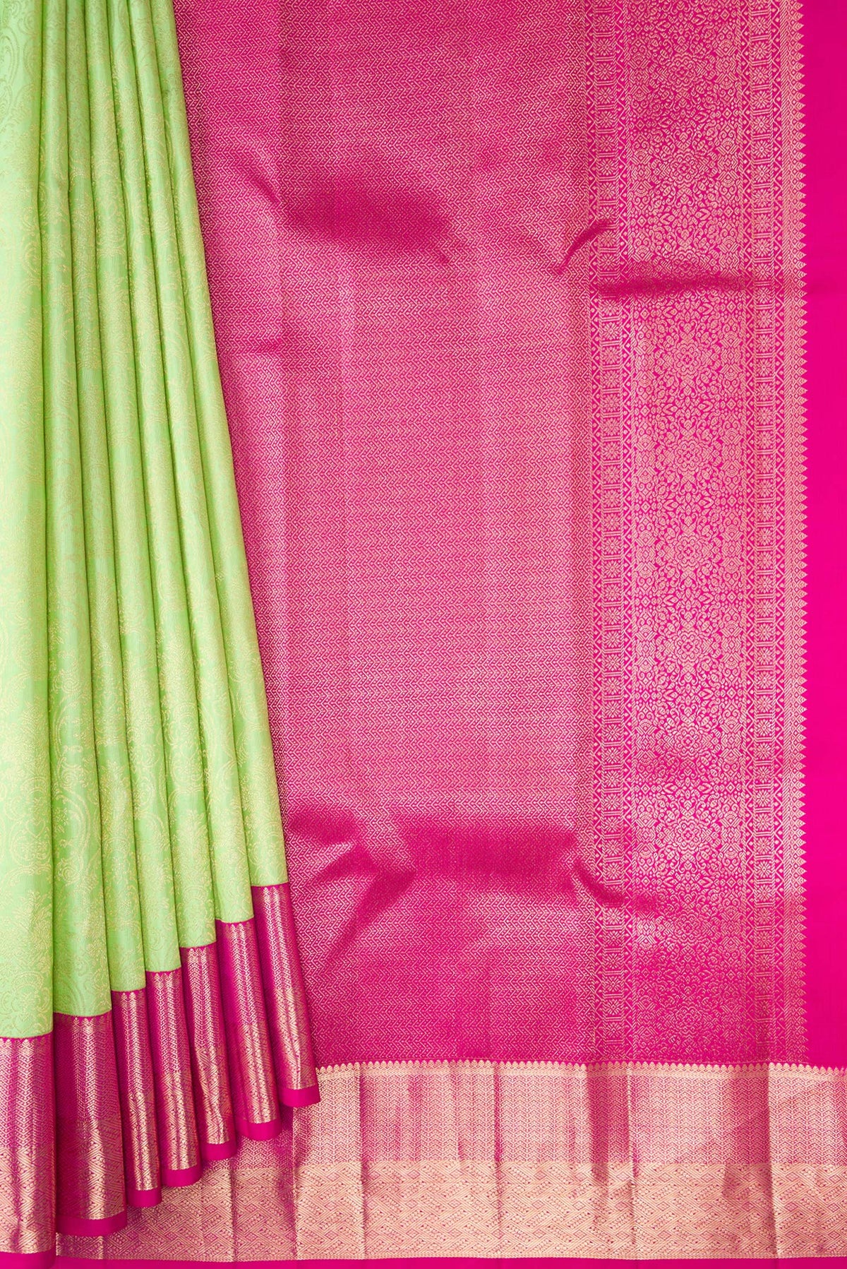 Pleats and pallu of Parrot Green Dual Tone Kanjivaram Silk Saree with Zari Brocade on the body and Zari Border. 