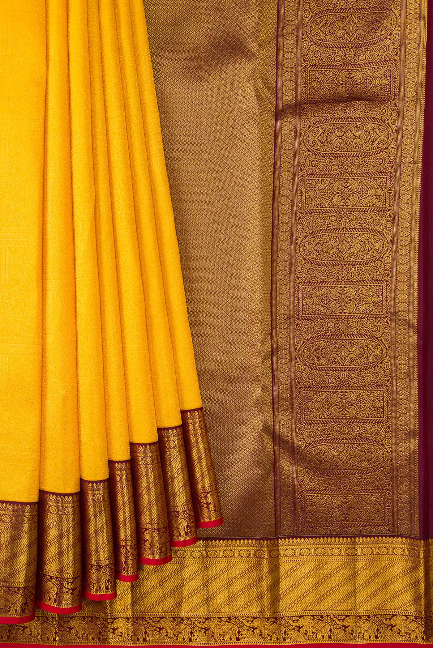Pleats and pallu of Yellow Dual Tone Kanjivaram Silk Saree with Zari Brocade on the body and Zari Border. 
