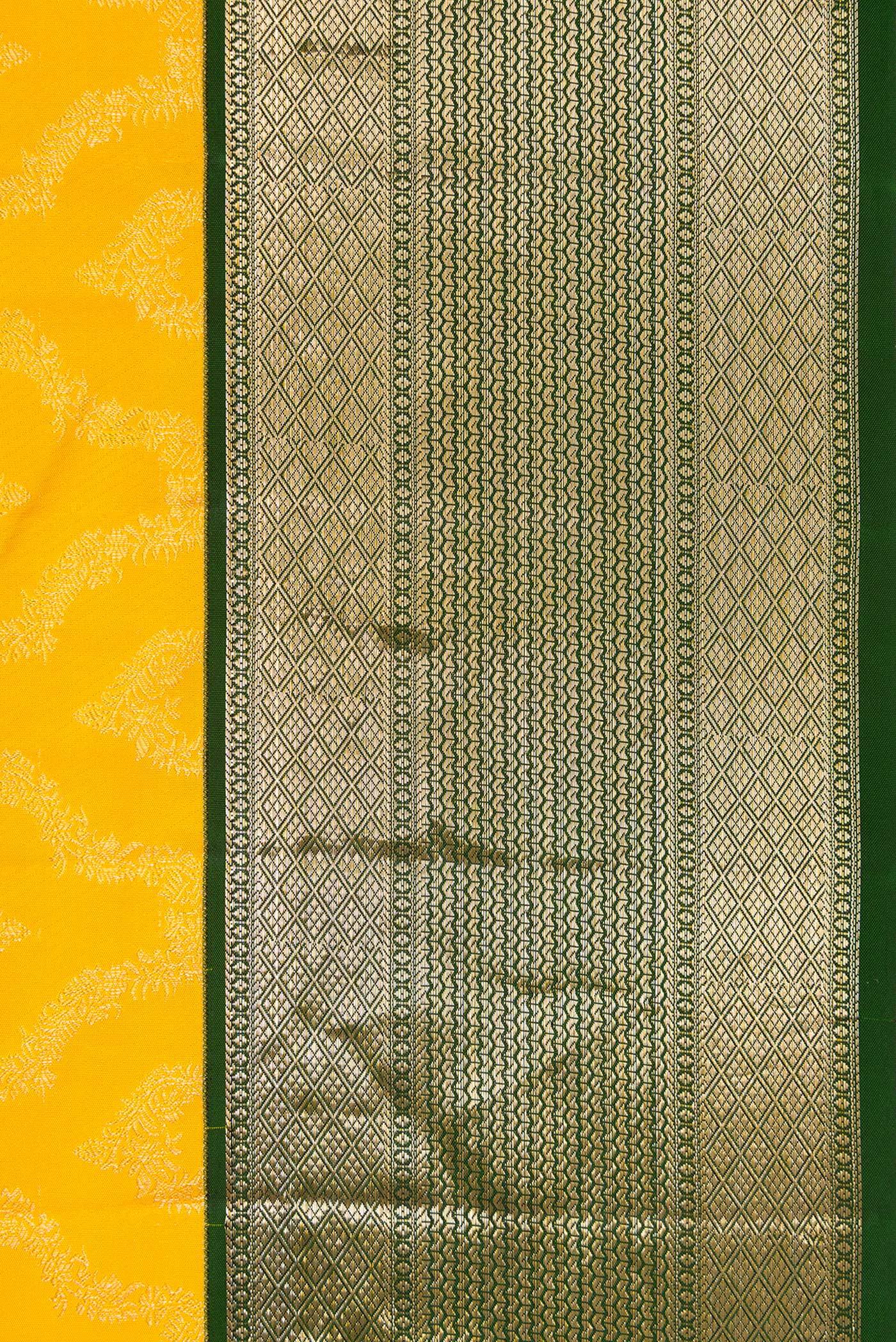 Border image of Yellow Dual Tone Kanjivaram Silk Saree with Zari Brocade on the body and Zari Border. 