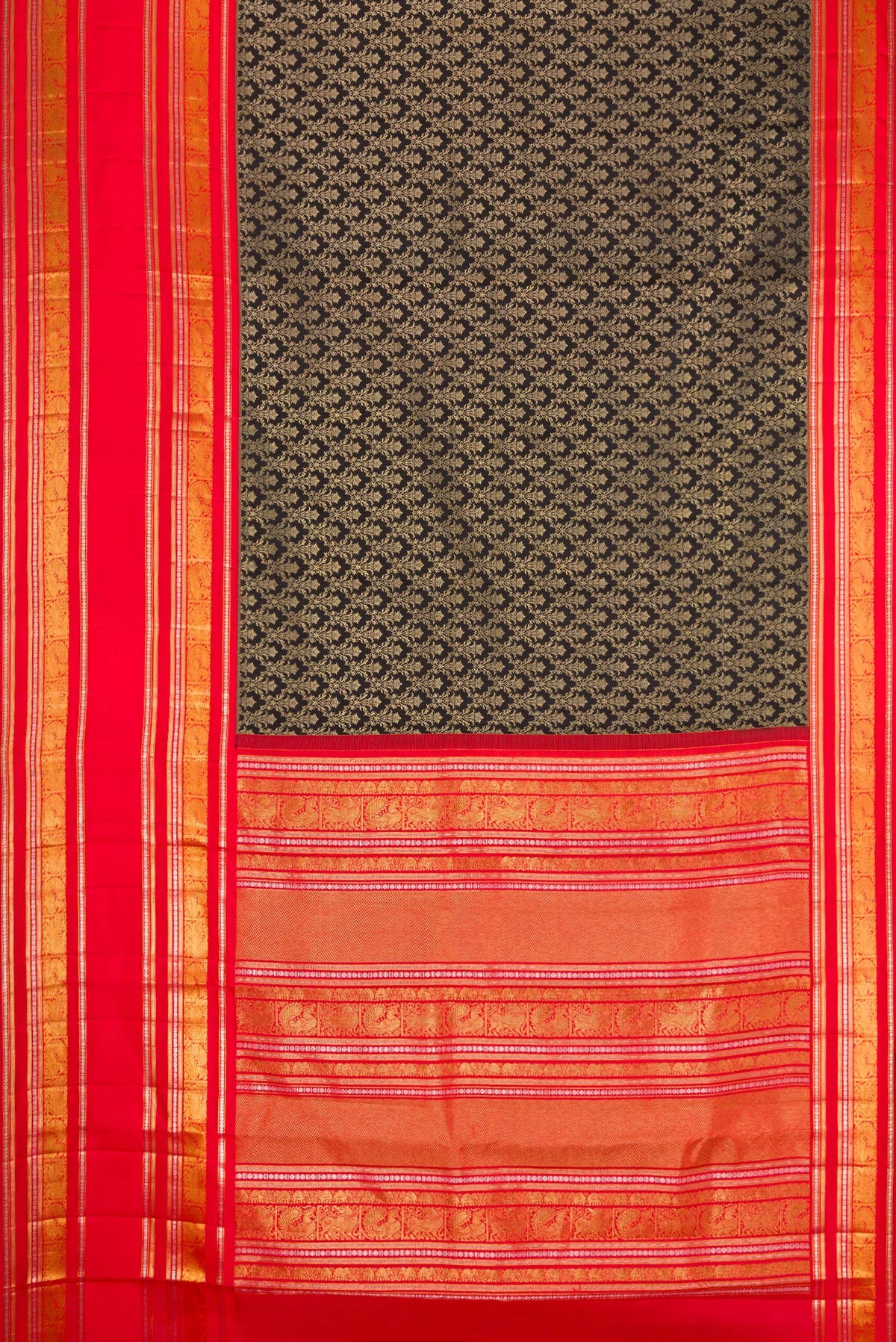 Flat view of Black Dual Tone Kanjivaram Silk Saree with Zari Brocade on the body and Zari Border. 