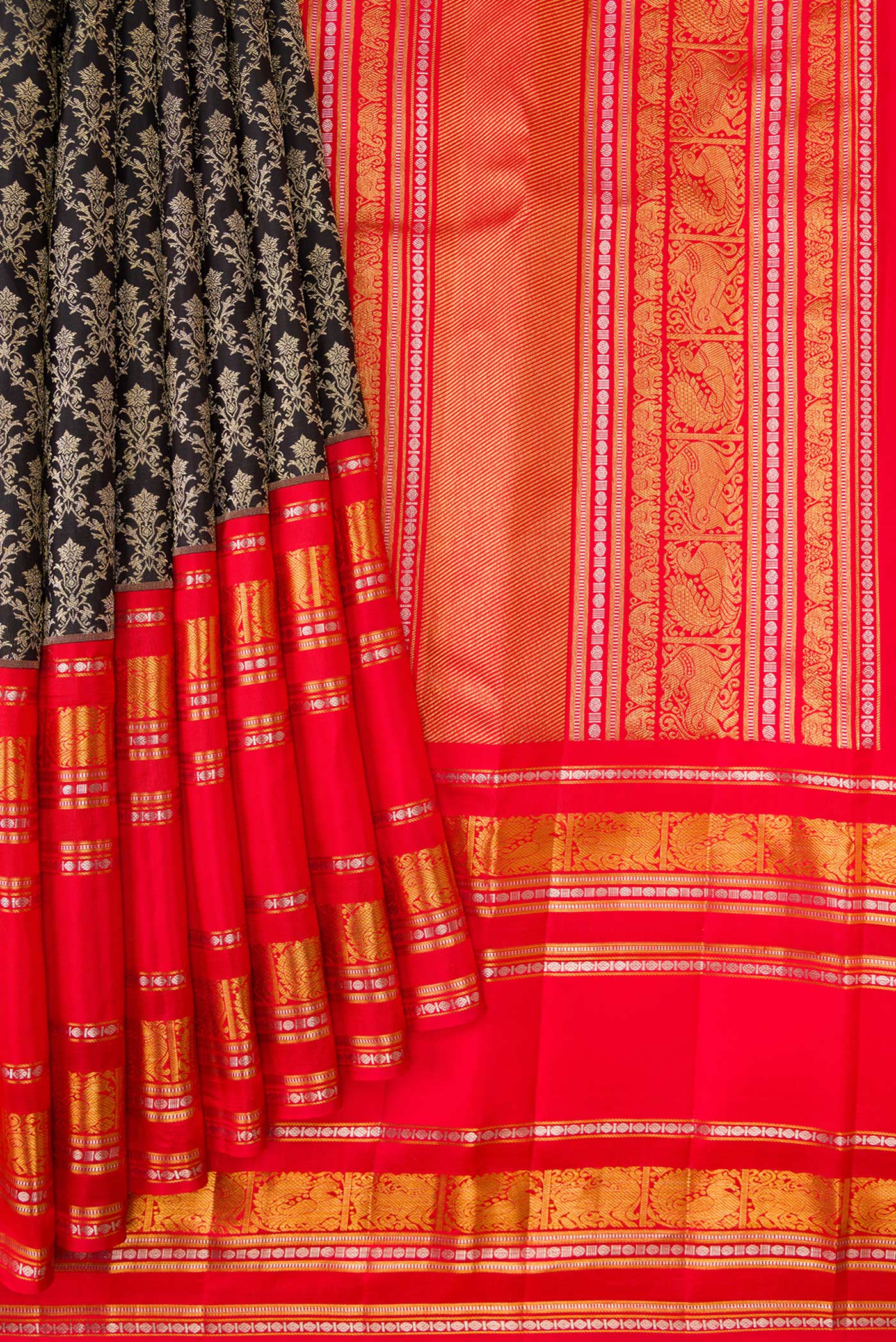 Pleats and pallu of Black Dual Tone Kanjivaram Silk Saree with Zari Brocade on the body and Zari Border. 