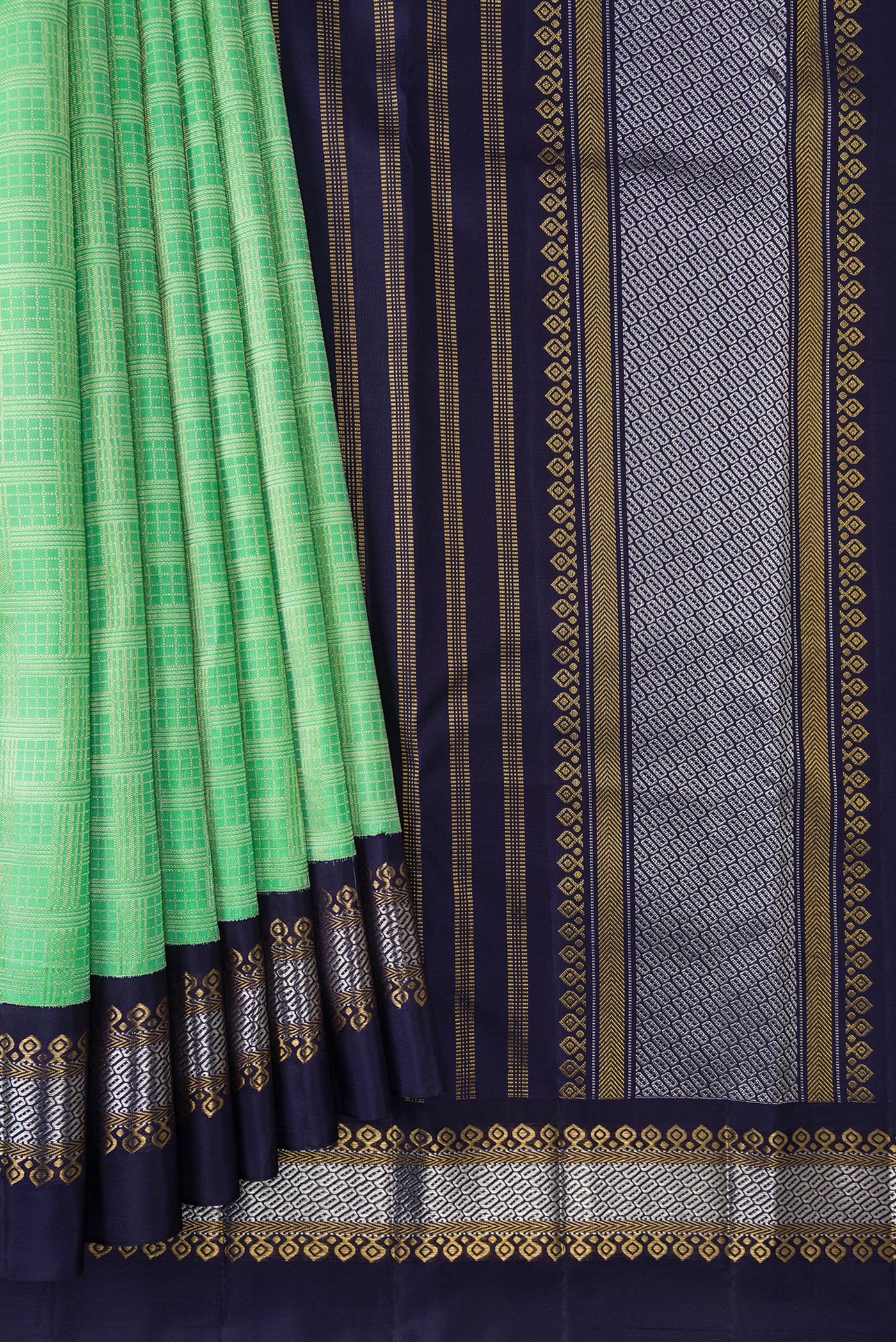 Pleats and pallu of Parrot Green Dual Tone Kanjivaram Silk Saree with Zari Brocade on the body and Zari Border. 