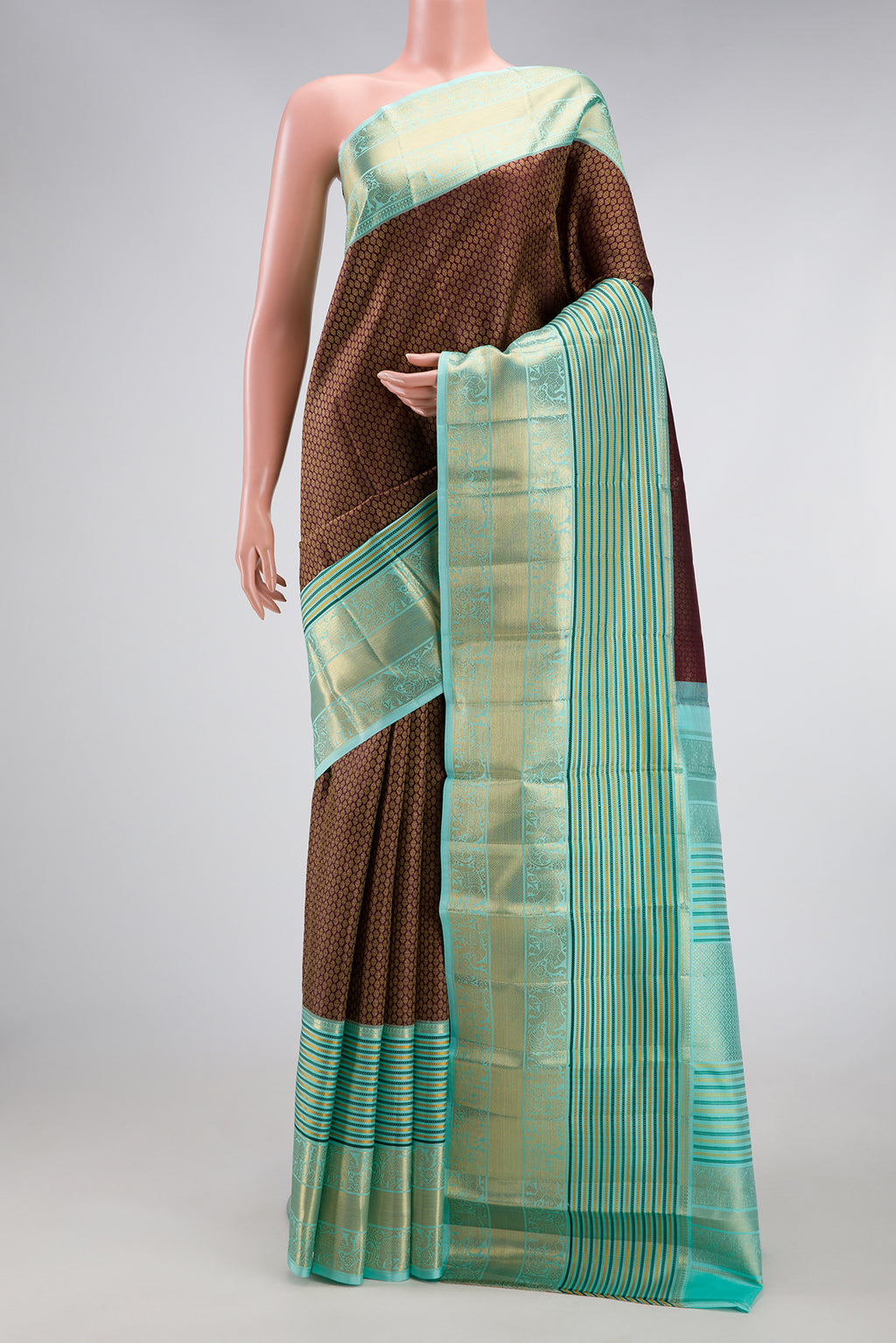 Coffee Brown Kanjivaram Silk Saree with Zari Brocade on the body and Zari Border.  displayed on a mannequin