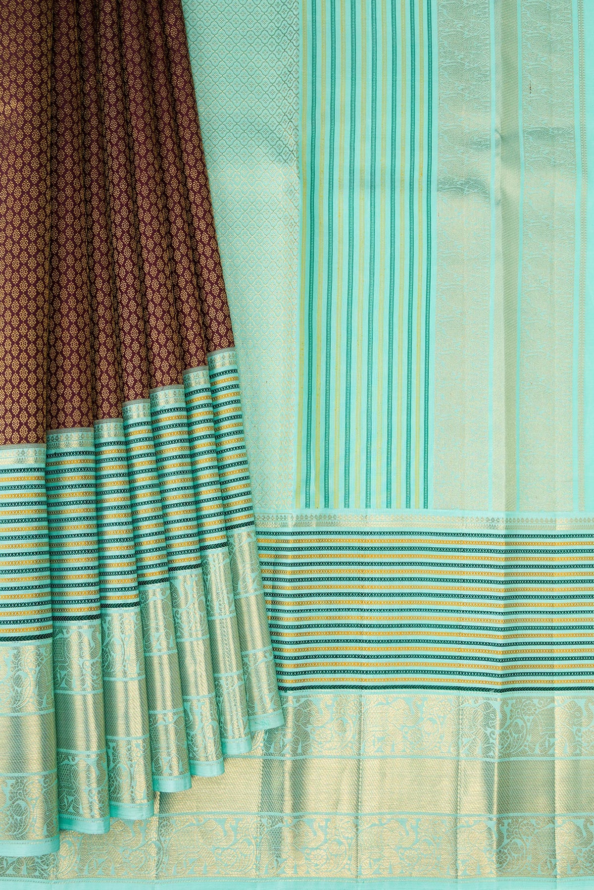 Pleats and pallu of Coffee Brown Kanjivaram Silk Saree with Zari Brocade on the body and Zari Border. 
