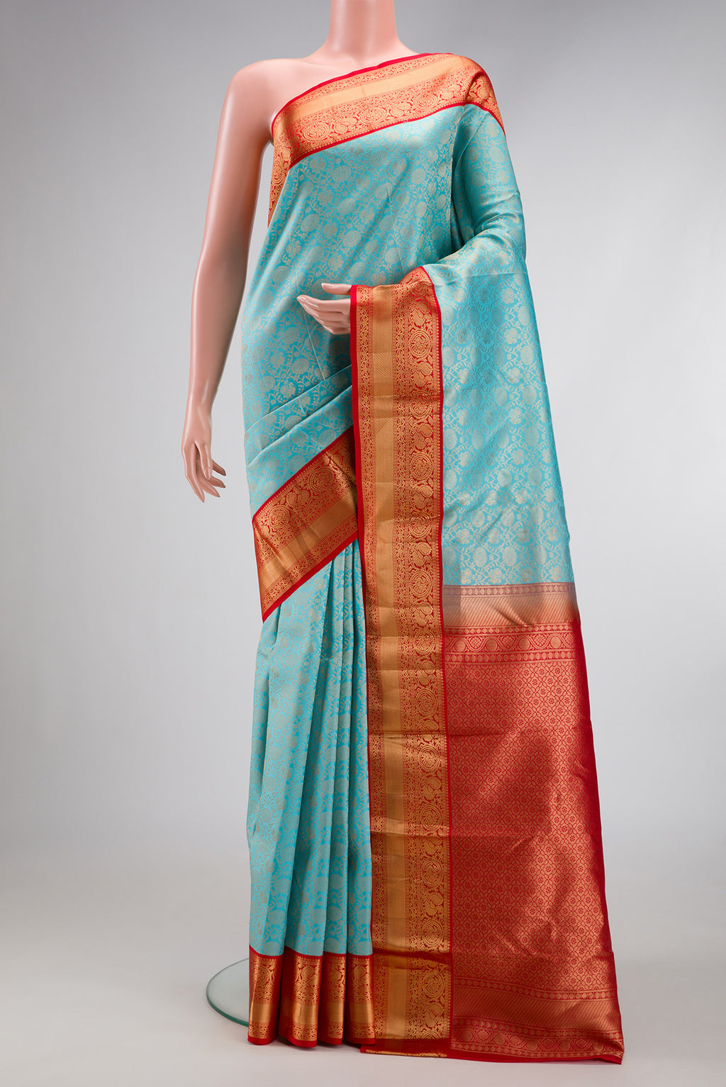 Sky Blue Dual Tone Kanjivaram Silk Saree with Zari Brocade on the body and Zari Border.  displayed on a mannequin