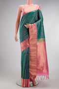 Peacock Blue Dual Tone Kanjivaram Silk Saree with Zari Brocade on the body and Zari Border.  displayed on a mannequin