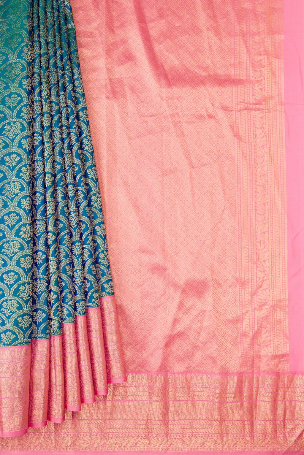Pleats and pallu of Peacock Blue Dual Tone Kanjivaram Silk Saree with Zari Brocade on the body and Zari Border. 