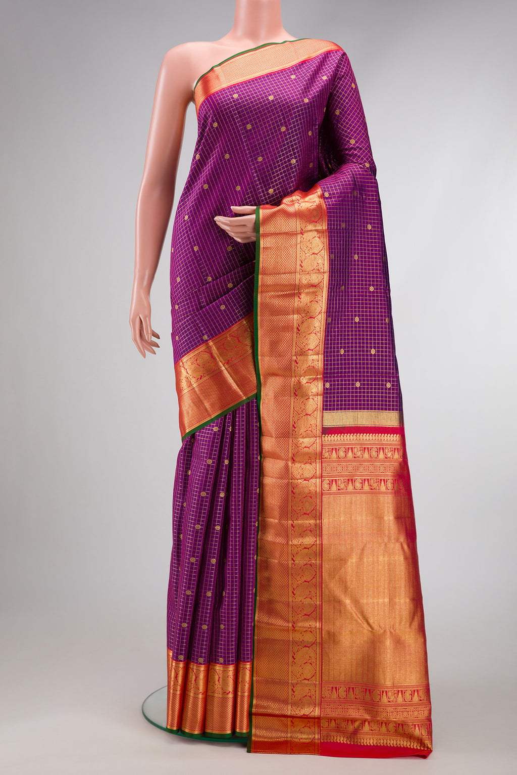 Purple Dual Tone Kanjivaram Silk Saree with Checked design on the body and Zari Border.  displayed on a mannequin