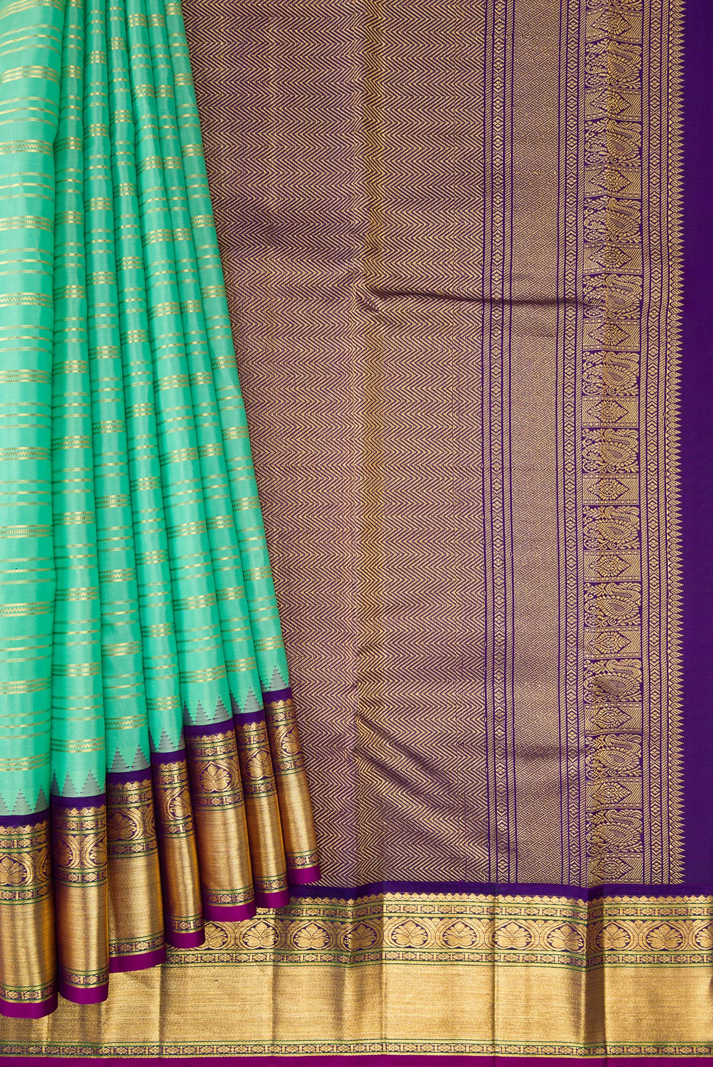 Pleats and pallu of Sea Green Dual Tone Kanjivaram Silk Saree with Stripes on the body and Zari Border. 