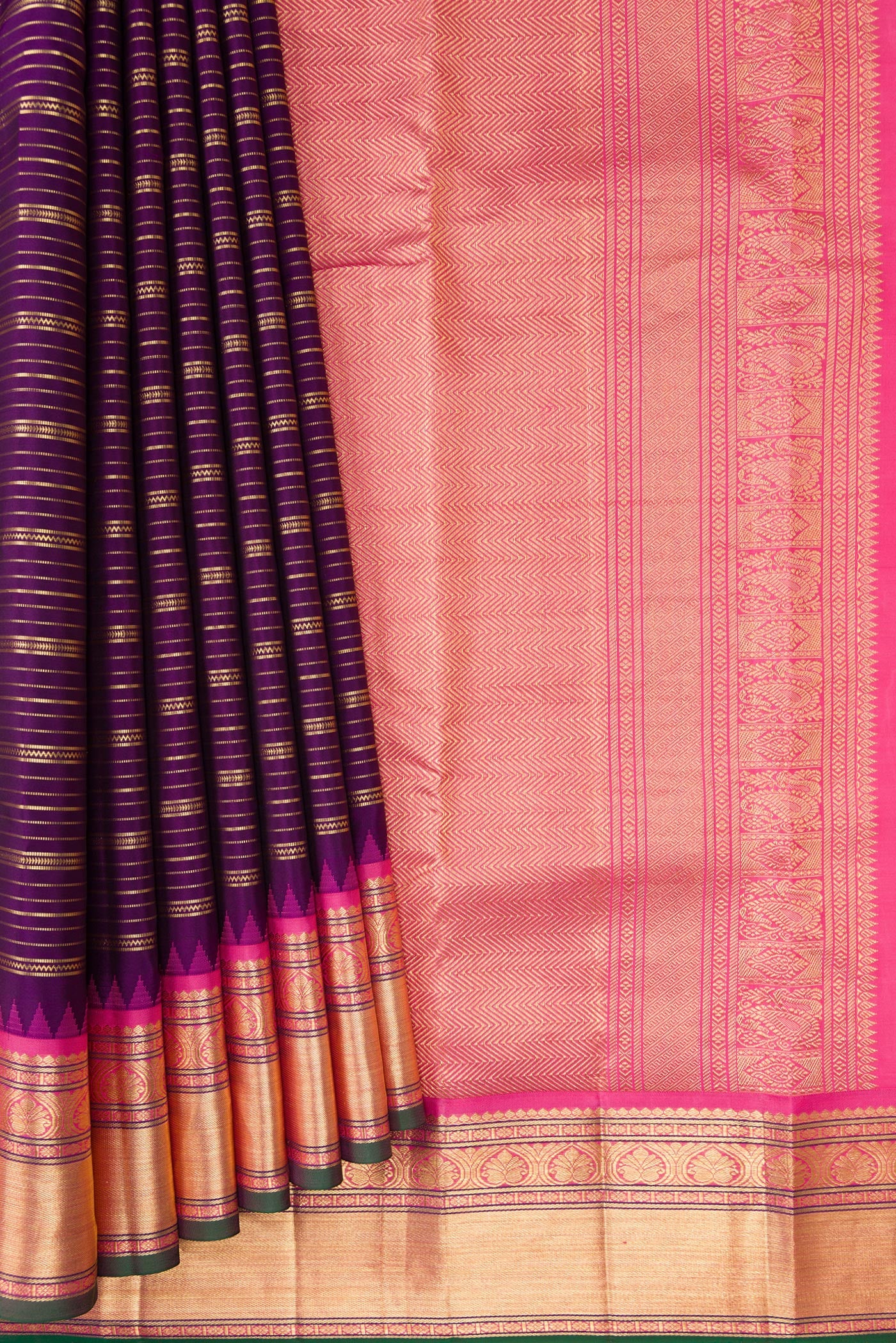 Pleats and pallu of Violet Dual Tone Kanjivaram Silk Saree with Stripes on the body and Zari Border. 