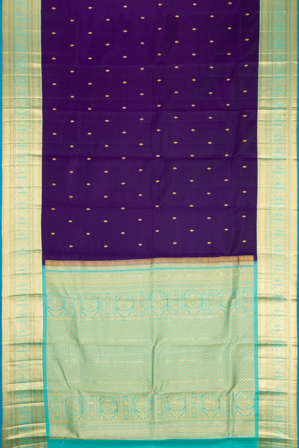 Flat view of Violet Dual Tone Kanjivaram Silk Saree with Zari Butta on the body and Zari Border. 