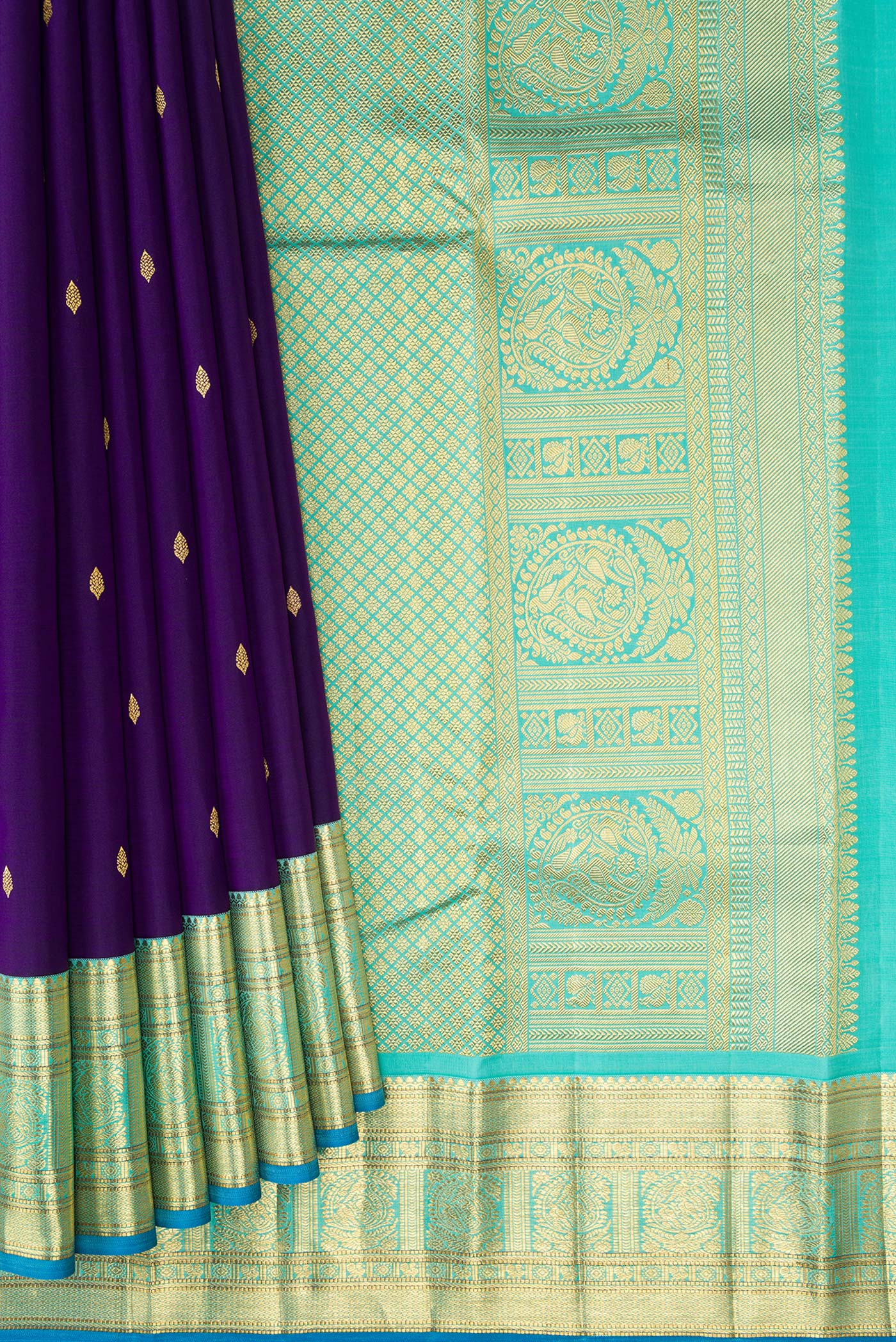 Pleats and pallu of Violet Dual Tone Kanjivaram Silk Saree with Zari Butta on the body and Zari Border. 