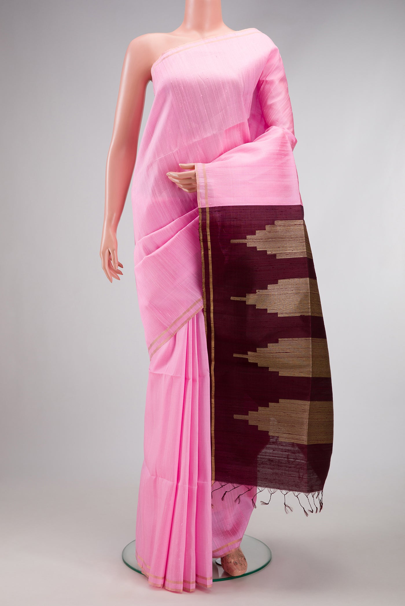 Pink Raw Silk Saree with Plain Body and Zari Border.  displayed on a mannequin