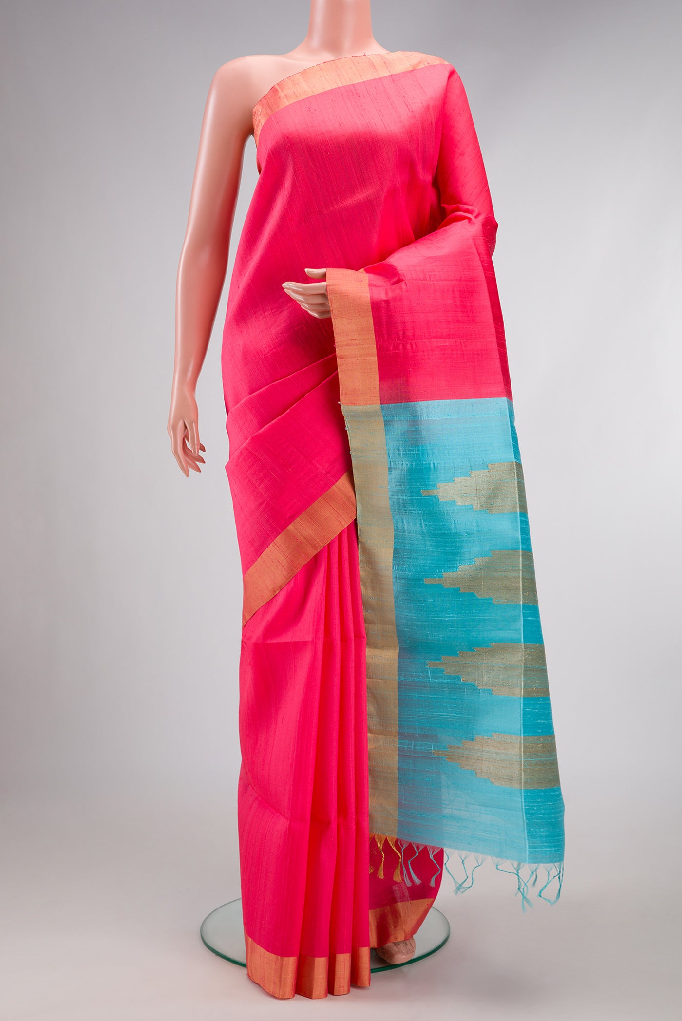 Pink Raw Silk Saree with Plain Body and Zari Border.  displayed on a mannequin
