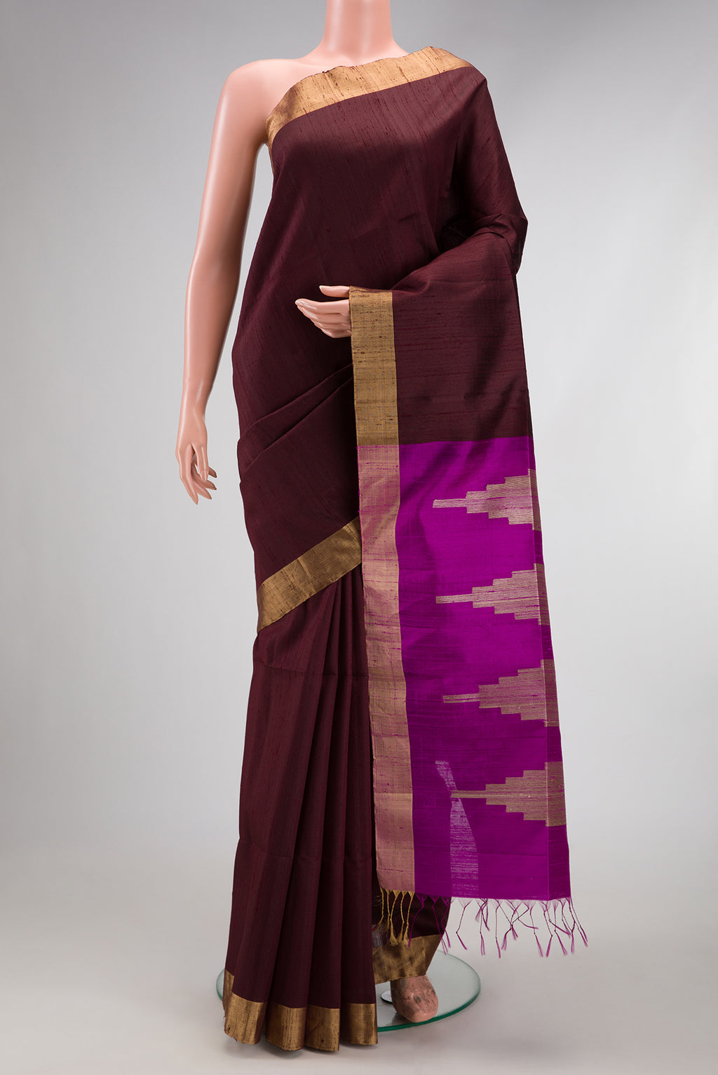 Coffee Brown Raw Silk Saree with Plain Body and Zari Border.  displayed on a mannequin