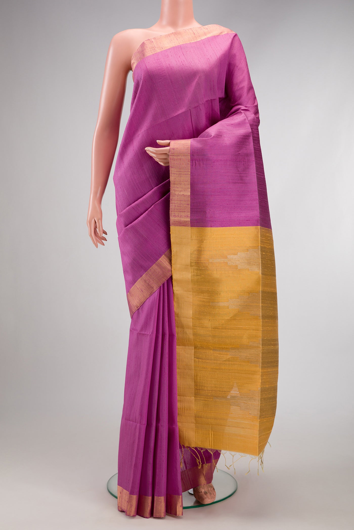 Lavender Raw Silk Saree with Plain Body and Zari Border.  displayed on a mannequin