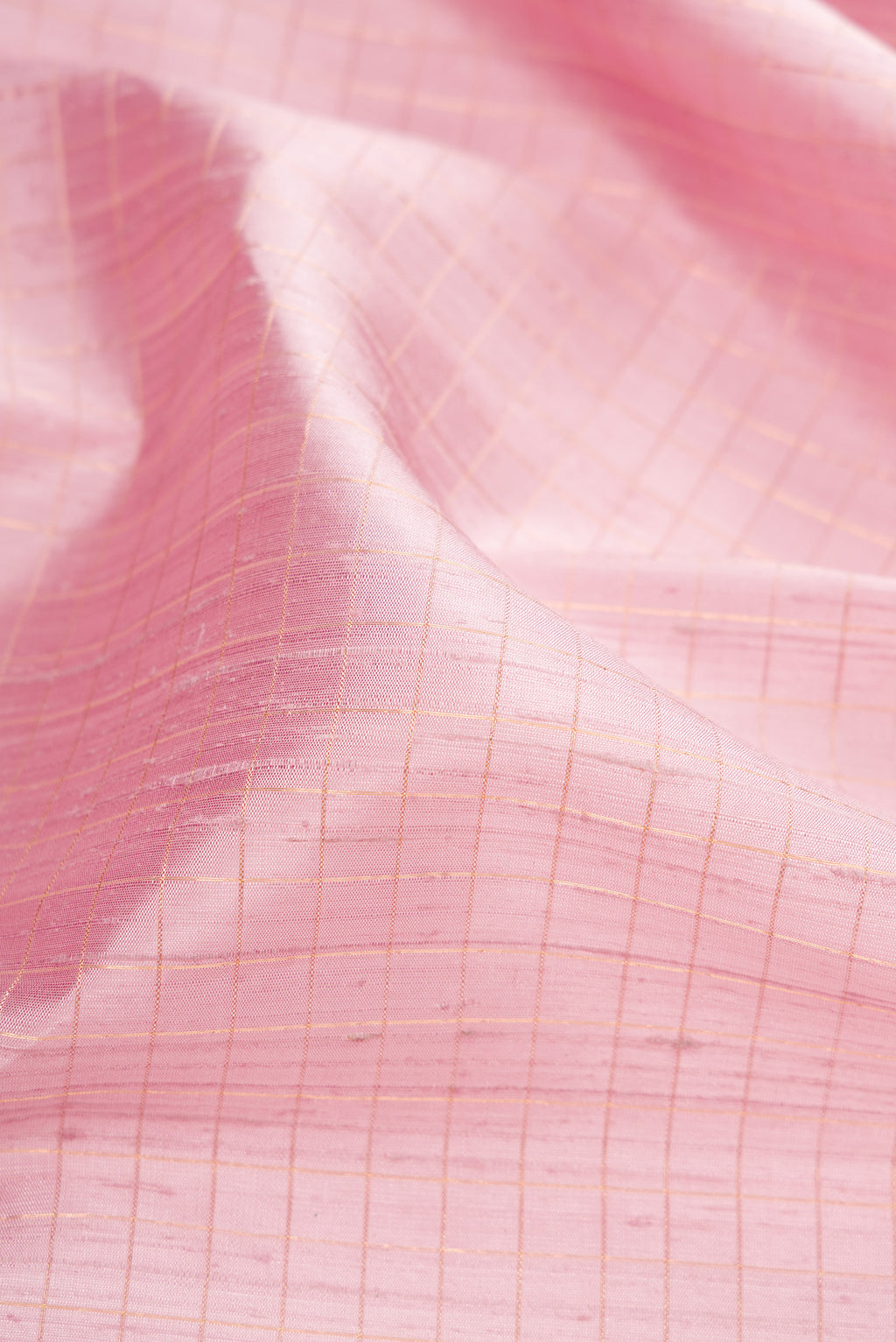 Close up of Lavender Raw Silk Saree with Checked design on the body and Thin Zari Line.  displaying folds