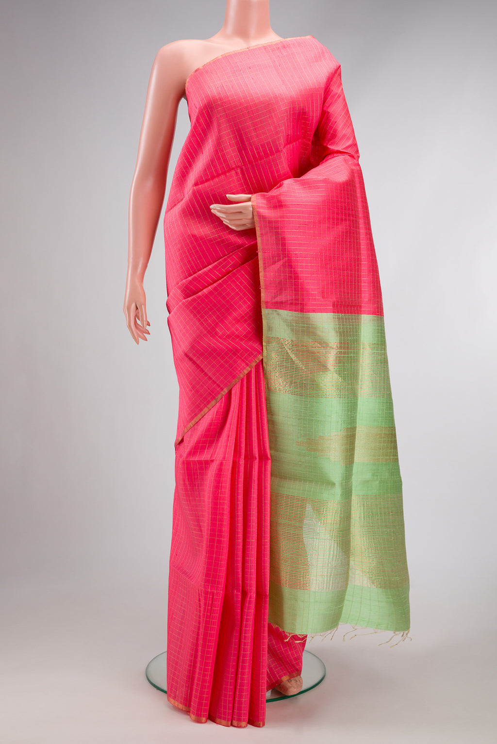 Pink Dual Tone Raw Silk Saree with Checked design on the body and Zari Border.  displayed on a mannequin