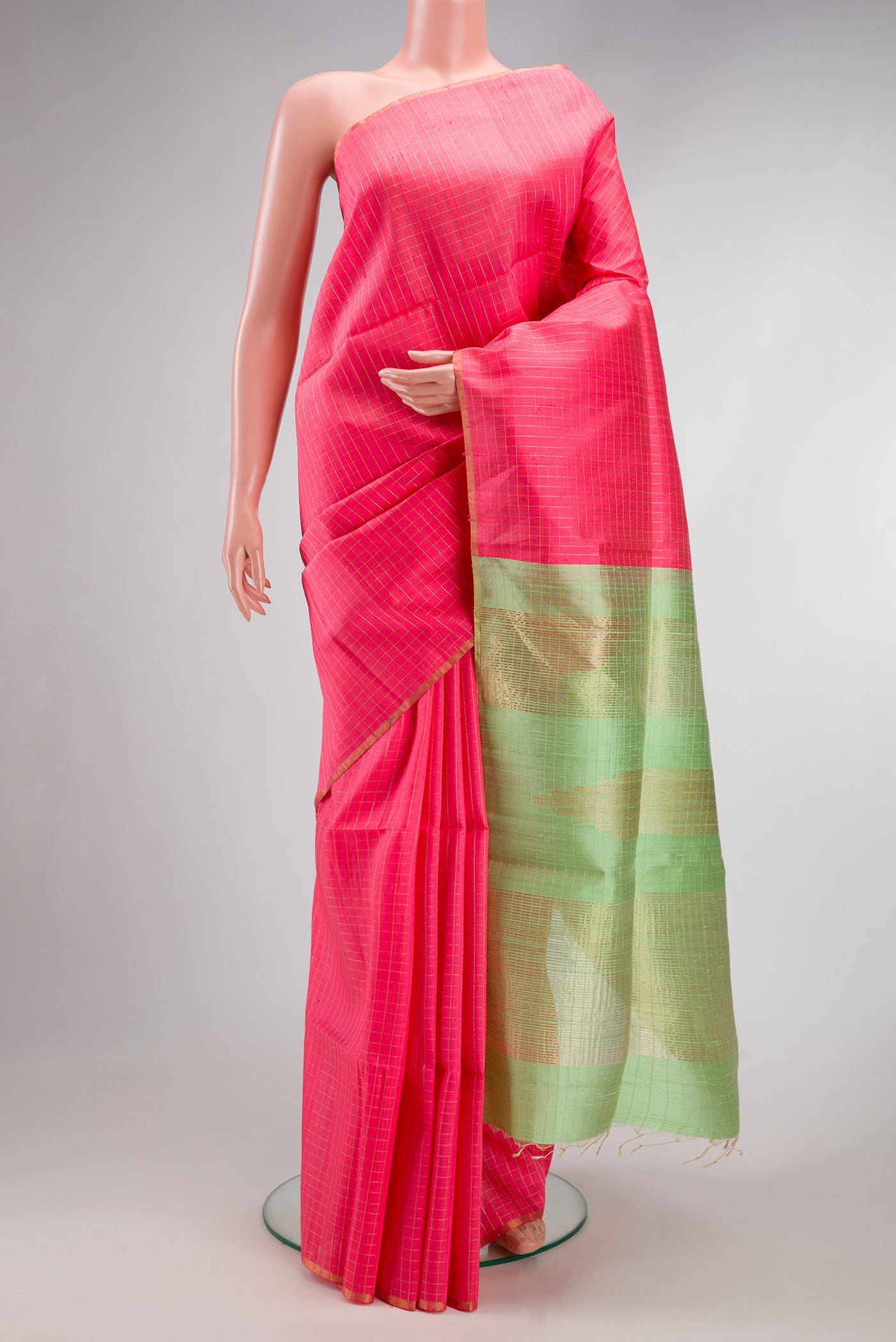 Pink Dual Tone Raw Silk Saree with Checked design on the body and Zari Border.  displayed on a mannequin
