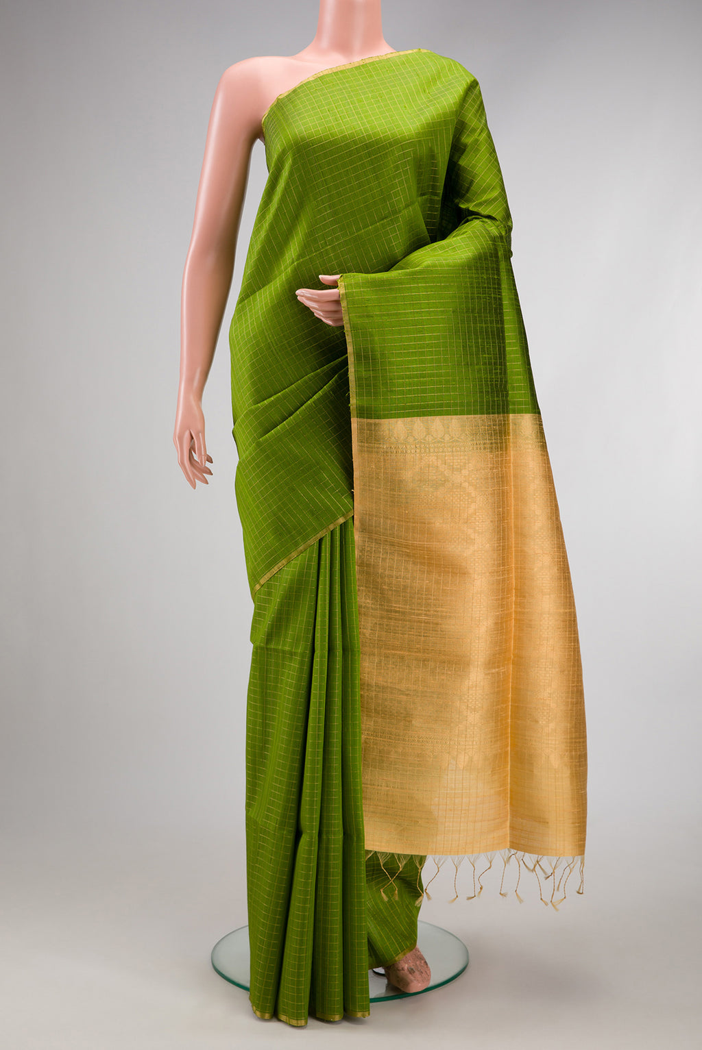 Green Dual Tone Raw Silk Saree with Stripes on the body and Zari Border.  displayed on a mannequin
