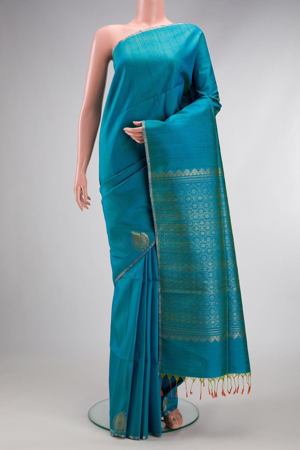 Peacock Blue Dual Tone Raw Silk Saree with Plain Body and Temple Border.  displayed on a mannequin