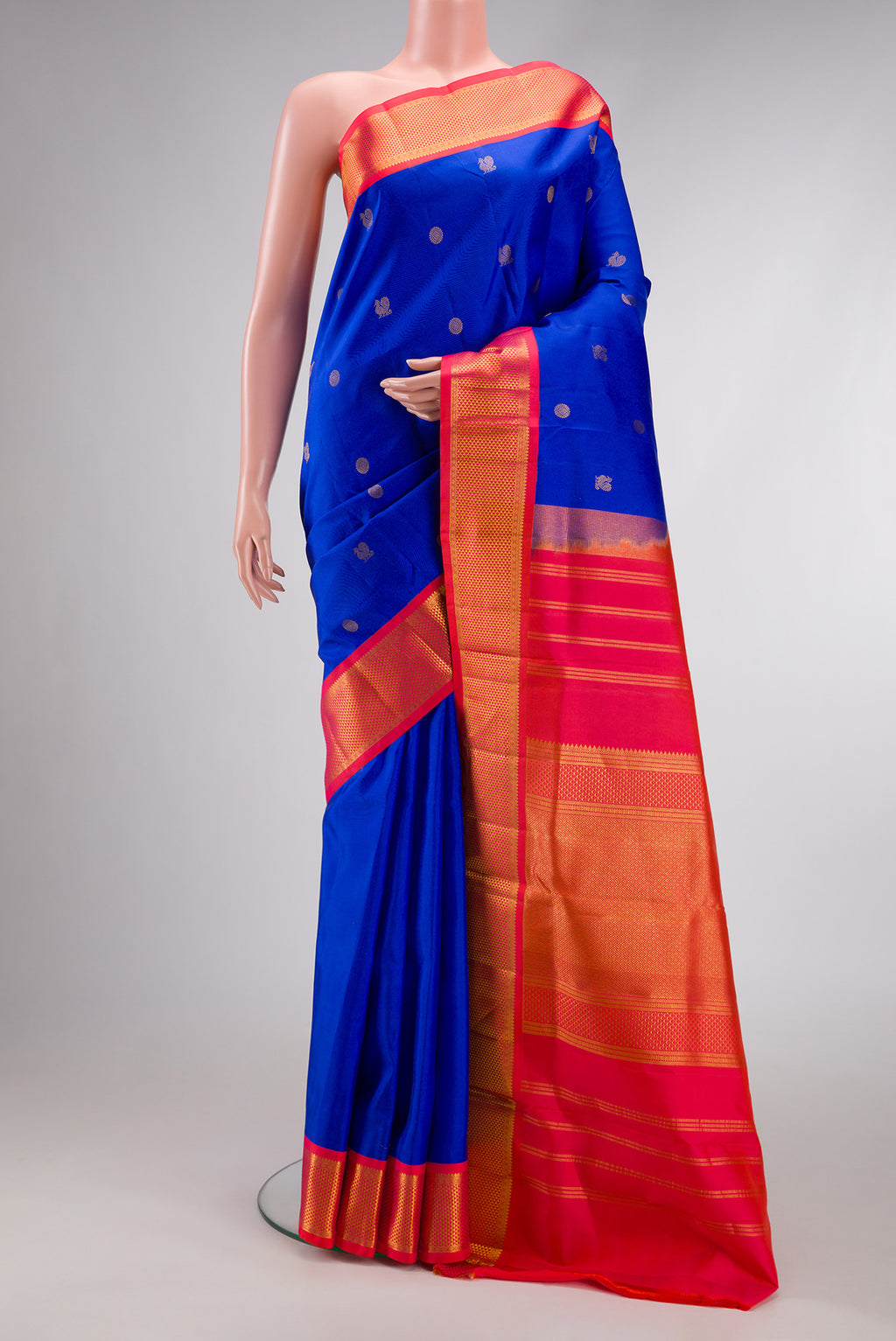 Pure Silk Pure Zari Royal Blue Dual Tone Kanjivaram Nine Yards Saree with Zari Butta on the body and Zari Border.  displayed on a mannequin