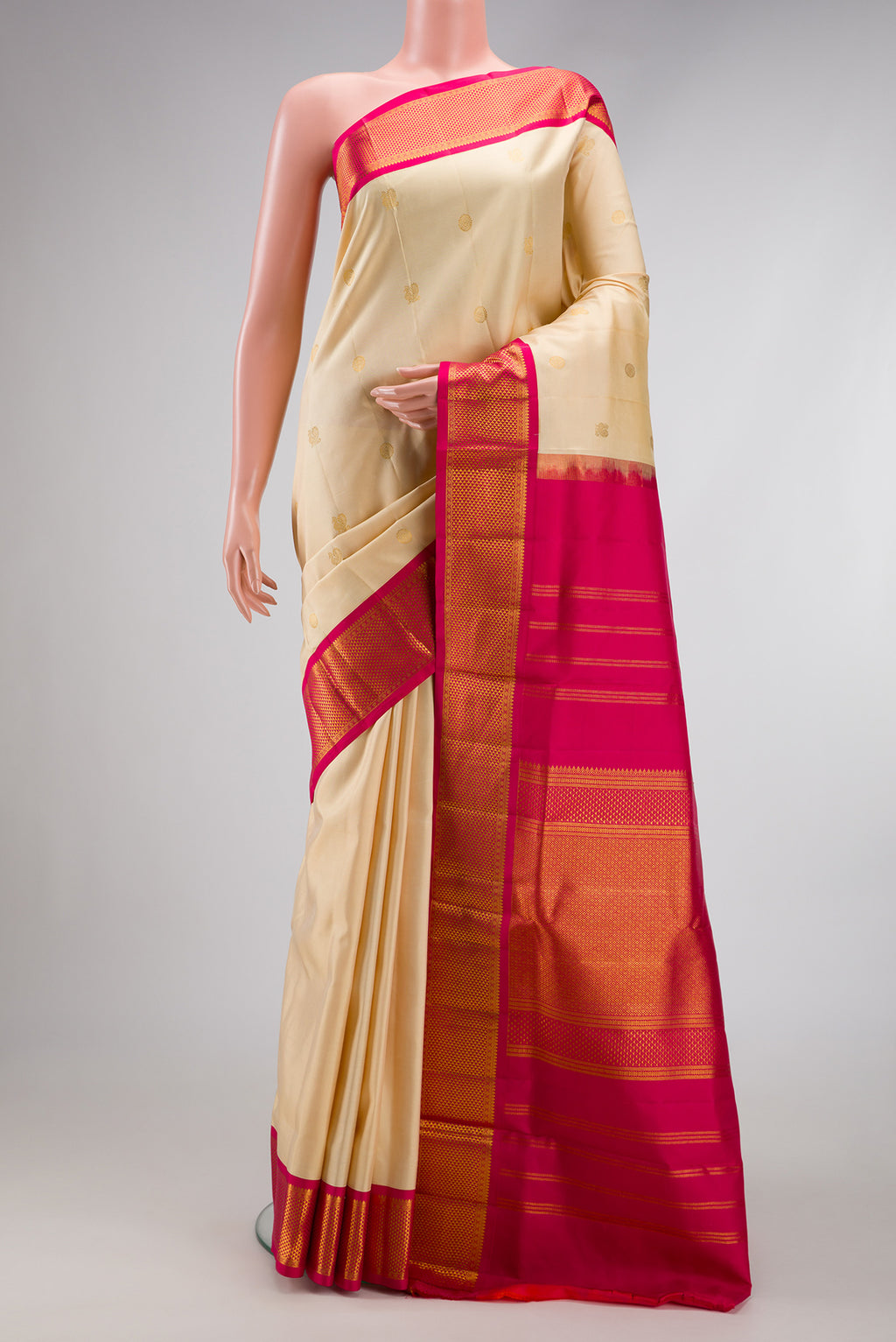 Pure Silk Pure Zari Off White Dual Tone Kanjivaram Nine Yards Saree with Zari Butta on the body and Zari Border.  displayed on a mannequin