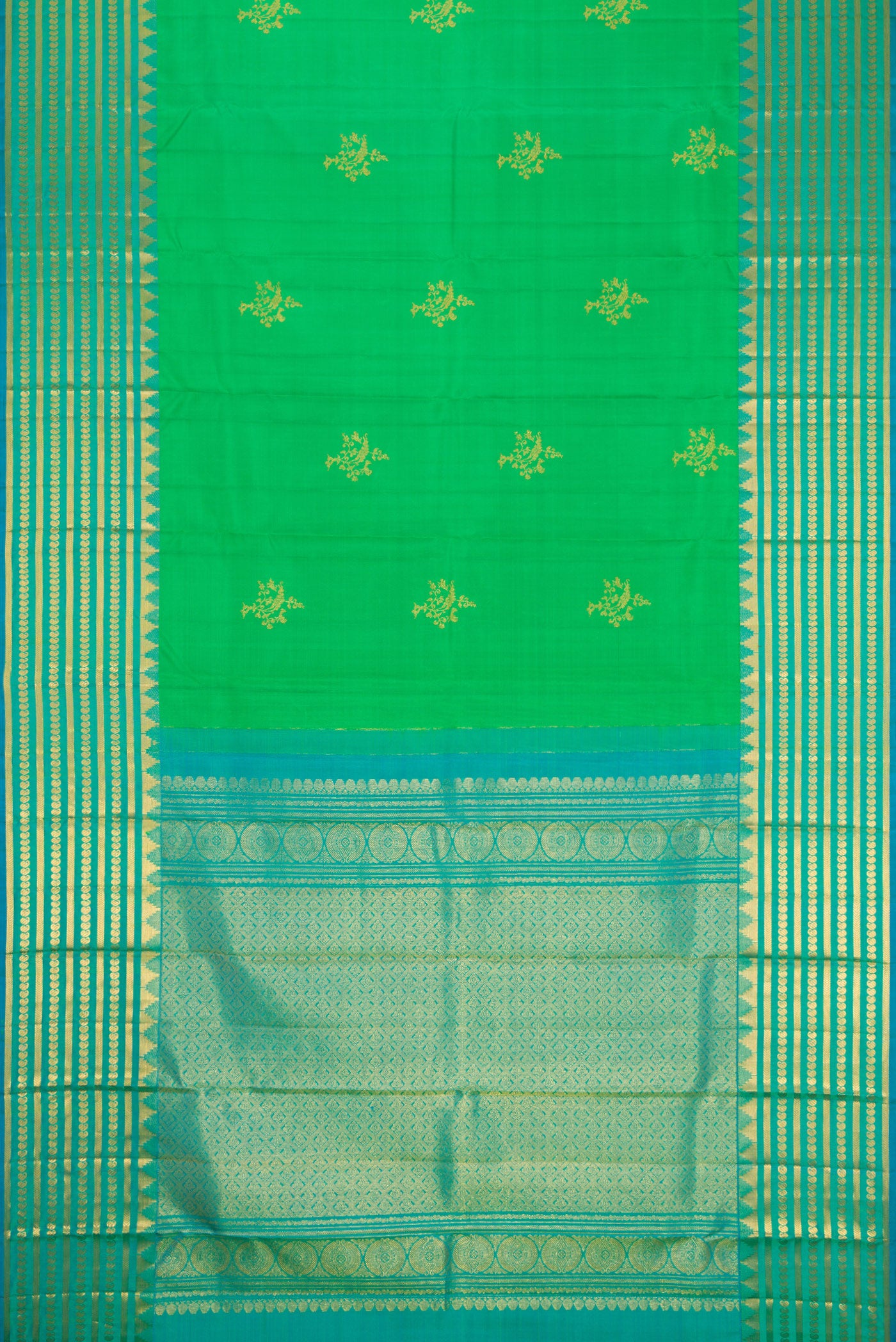 Flat view of Green Kanchipuram Silk Saree with Zari Butta on the body and Fancy Border. 