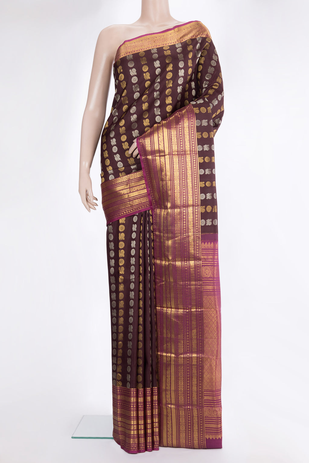 Pure Silk Coffee Brown Kanjivaram Saree with Zari Butta on the body and Zari Border.  displayed on a mannequin