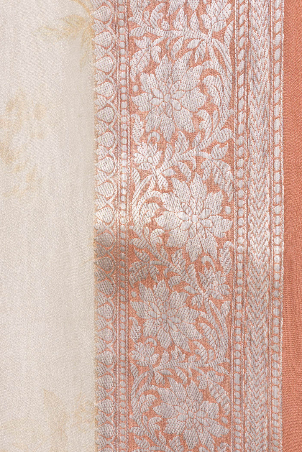 Border image of Beige Dual Tone Organza Silk Saree with Printed design on the body and Zari Border. 