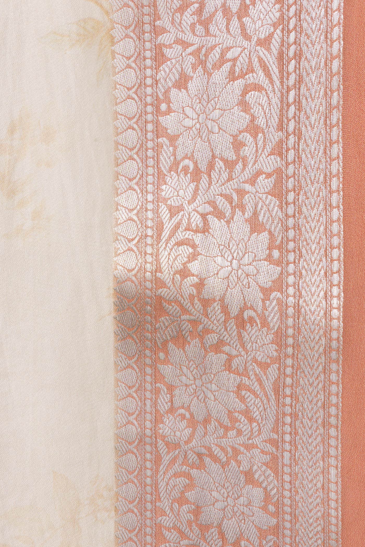 Border image of Beige Dual Tone Organza Silk Saree with Printed design on the body and Zari Border. 