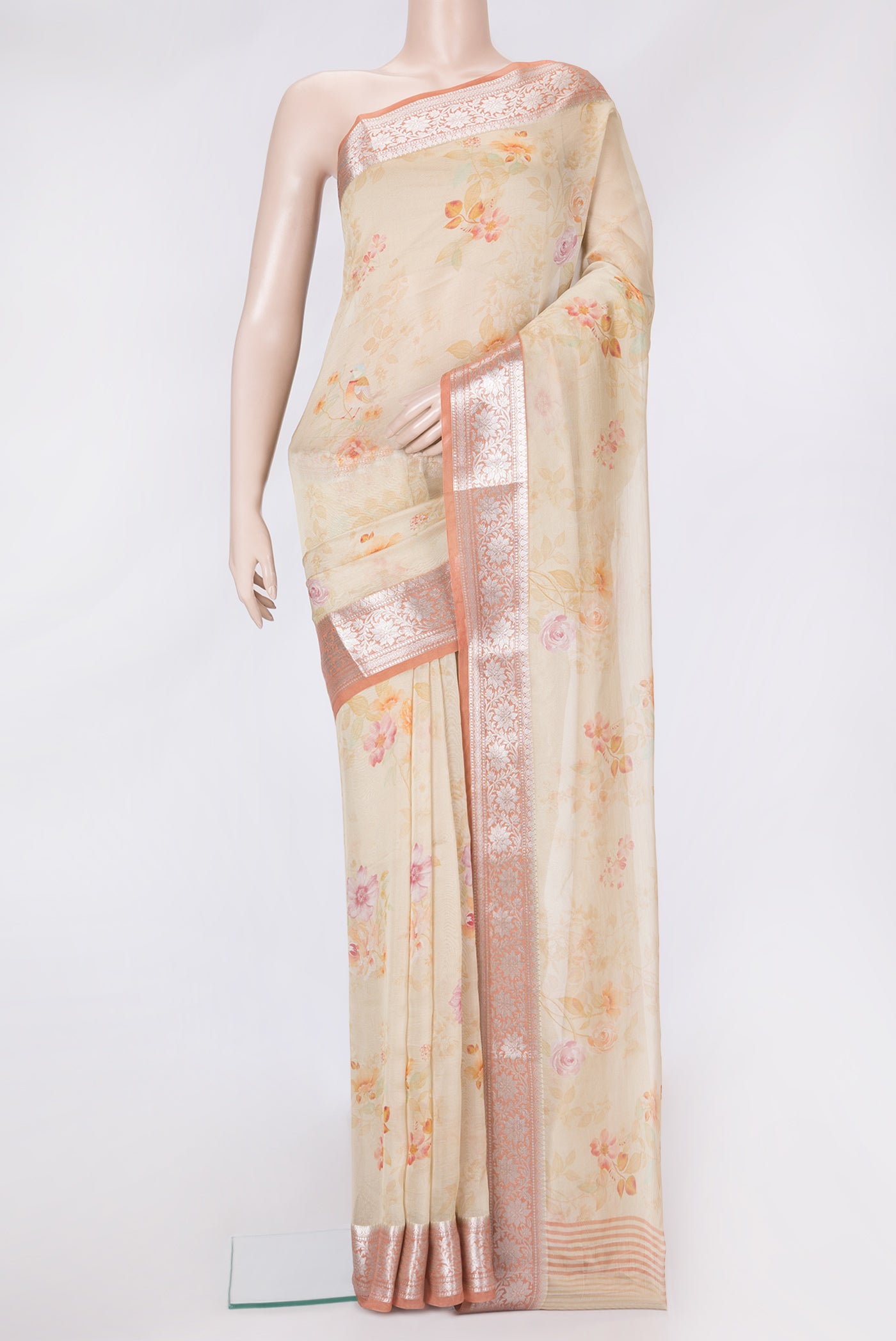 Beige Dual Tone Organza Silk Saree with Printed design on the body and Zari Border.  displayed on a mannequin