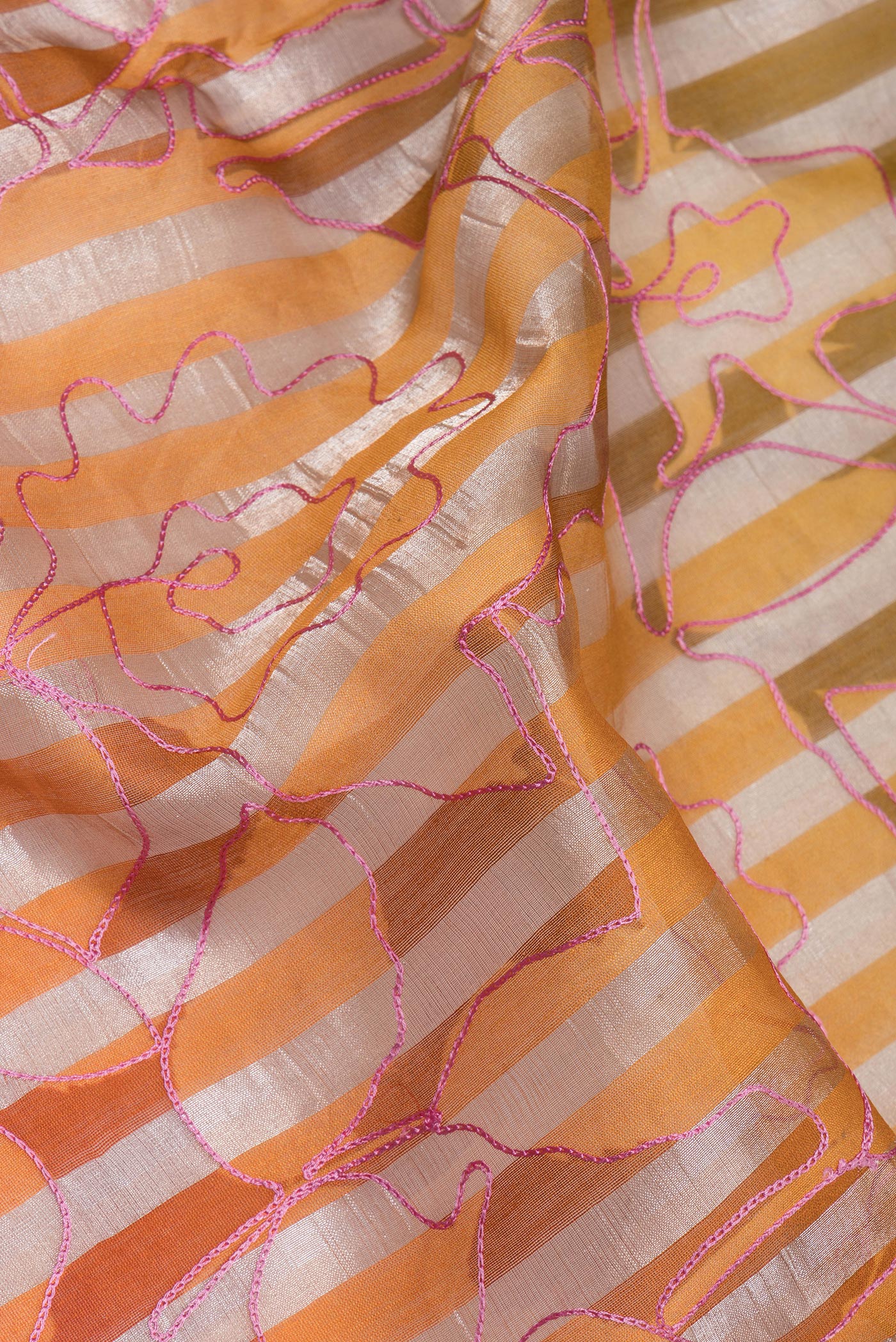 Close up of Pure Silk Multi Color Tussar Saree with Stripes on the body and Without Border.  displaying folds