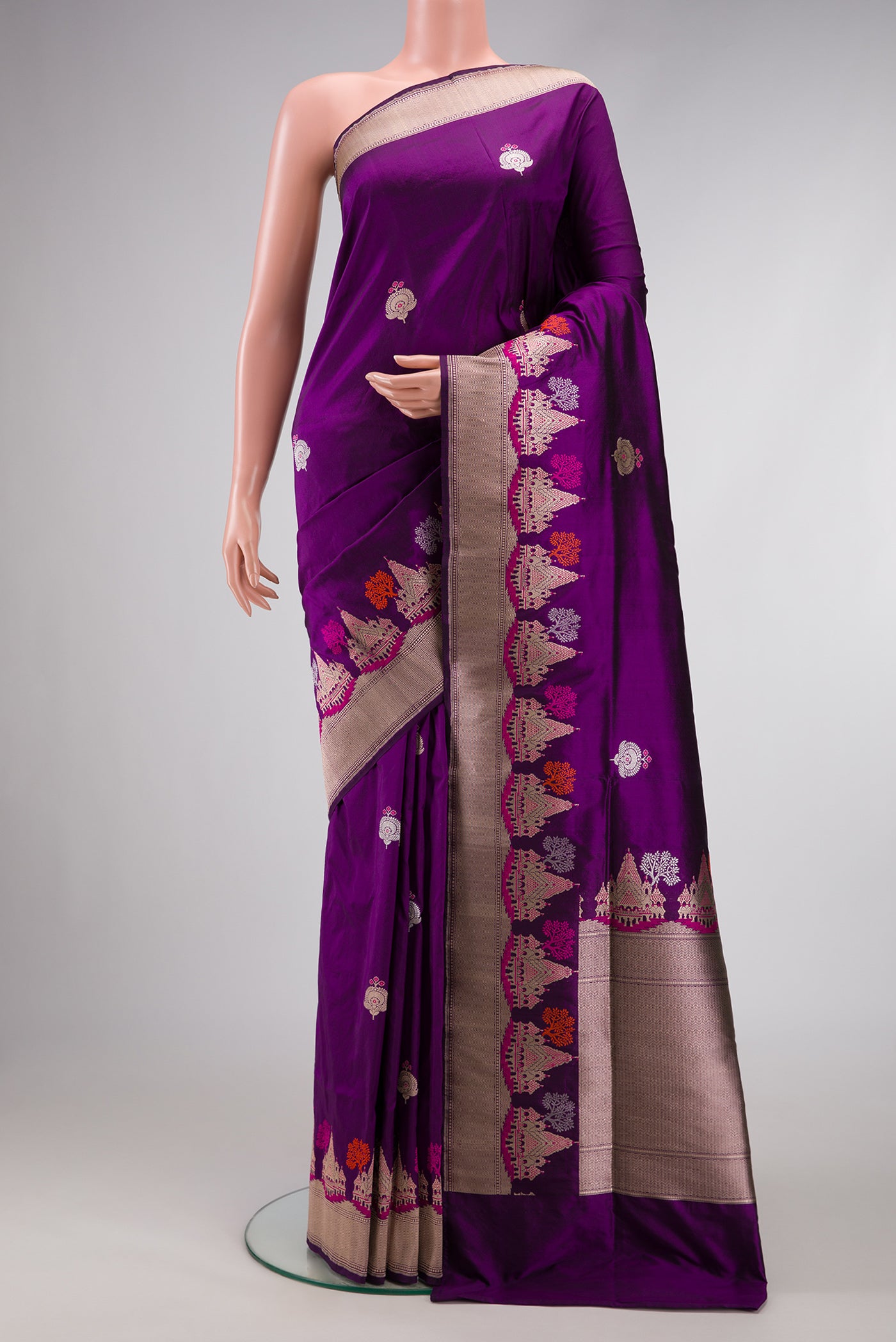 Violet Dual Tone Banarasi Silk Saree with Zari And Thread Butta on the body and Fancy Border.  displayed on a mannequin